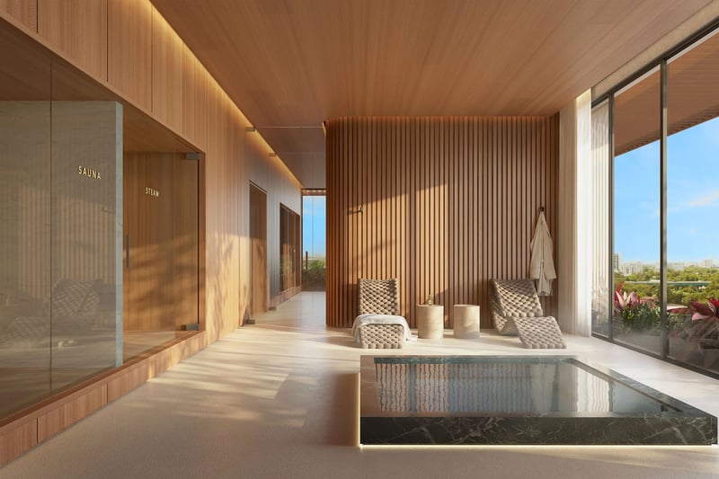 Colette Residences in Brickell luxury ultra luxury condos with a spa amenity featuring sauna and steam rooms, a plunge pool, lounge chairs, and tall windows.