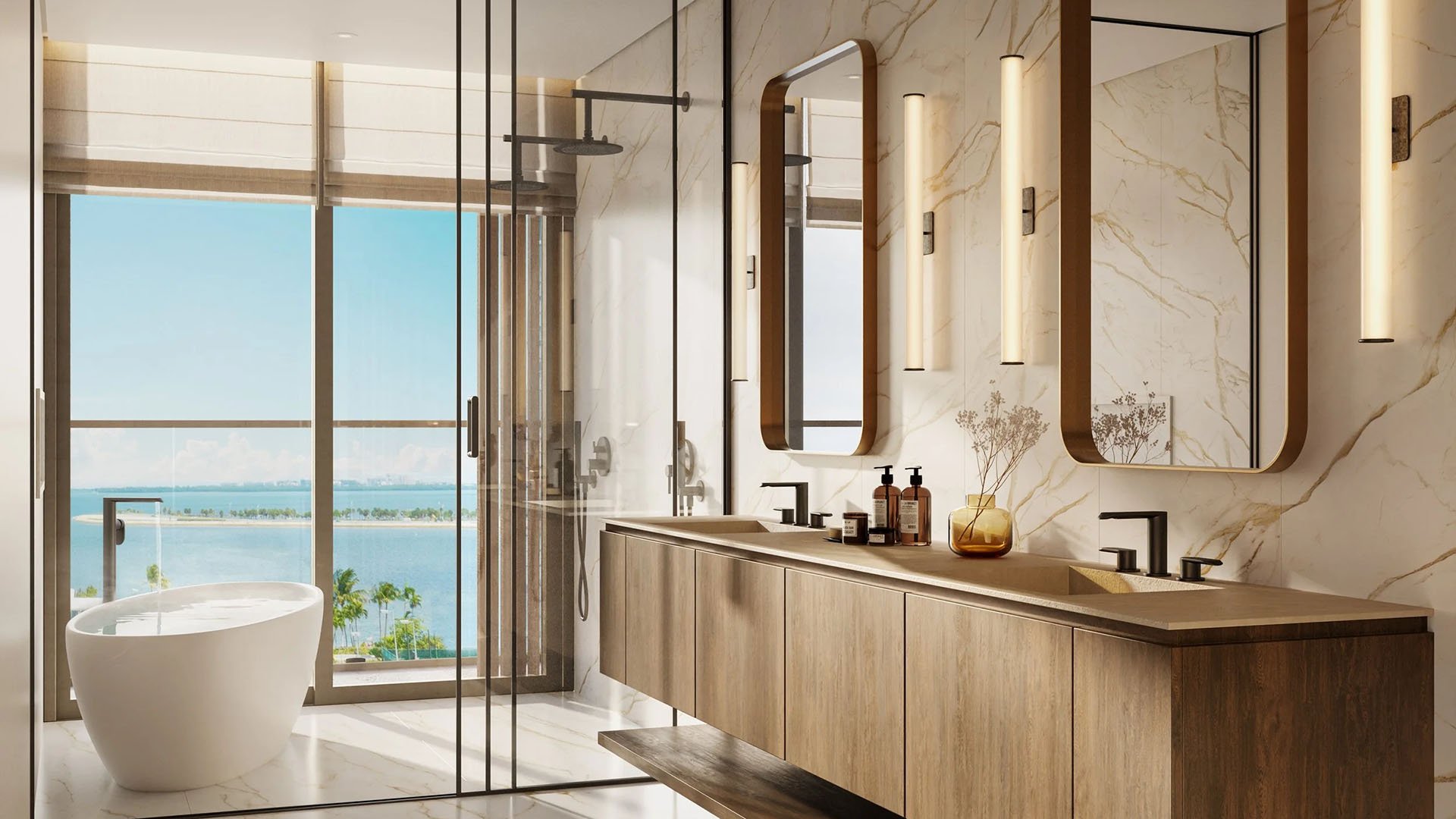 Colette Residences in Brickell luxury ultra luxury condos with a spa bathroom, double vanity, glass shower, freestanding tub, and a bright water view.