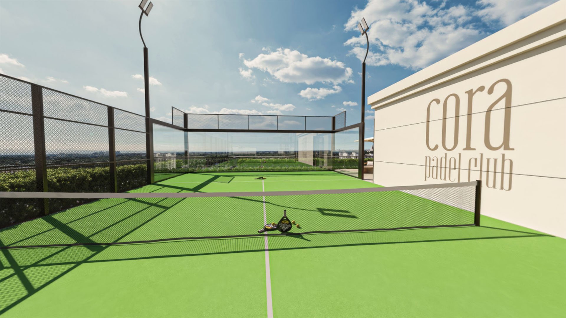 Rooftop padel court with open skyline views and a practice wall at Cora Merrick Park in Coral Gables, extending the amenity offering for luxury and ultra luxury condos.