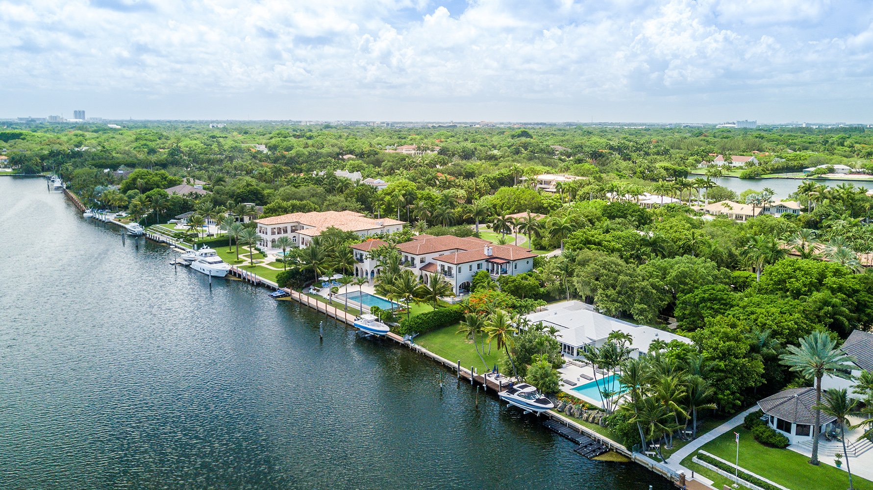 Bay view of Coral Gables waterfront luxury homes—prime South Florida zone near luxury and ultra luxury condos, with preconstruction and resale activity.