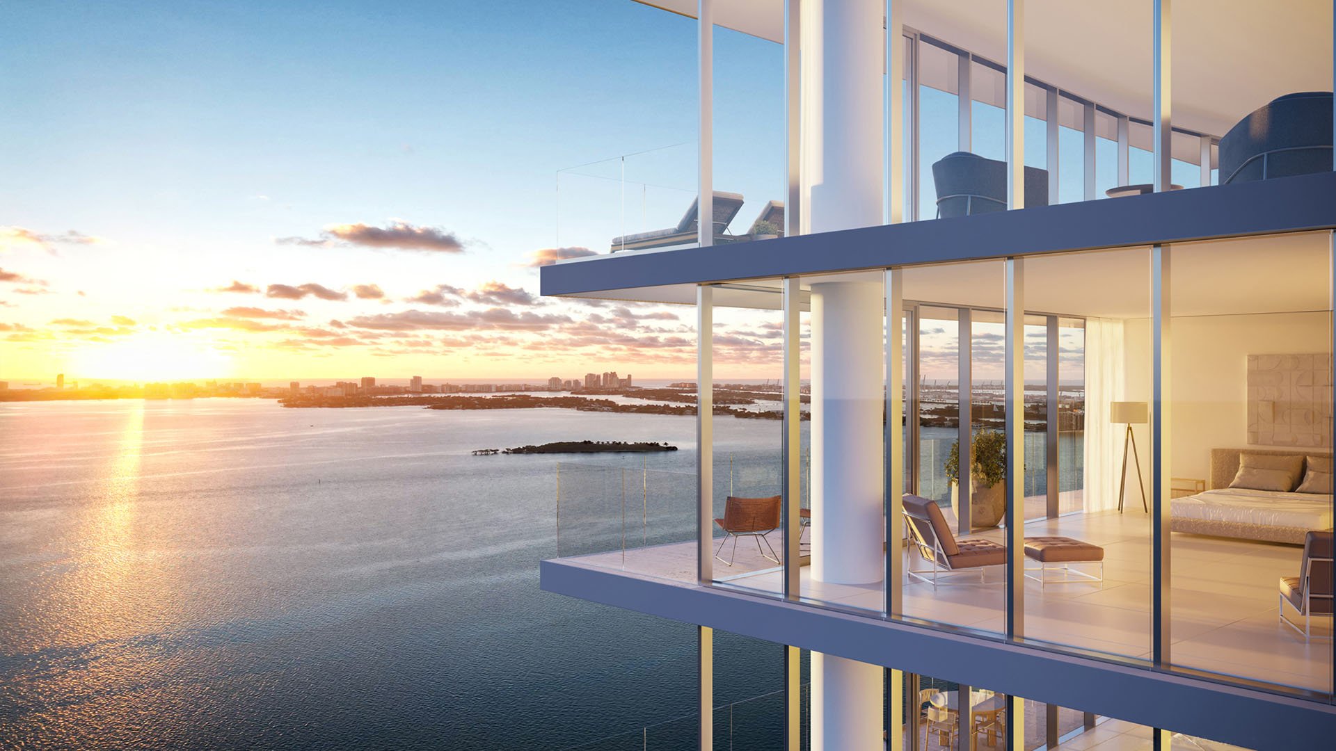 Cove Miami in Miami presents luxury and ultra luxury condos in preconstruction, featuring a corner balcony cantilevered over the water with sunset views, wraparound glass, and an exposed bedroom beyond.