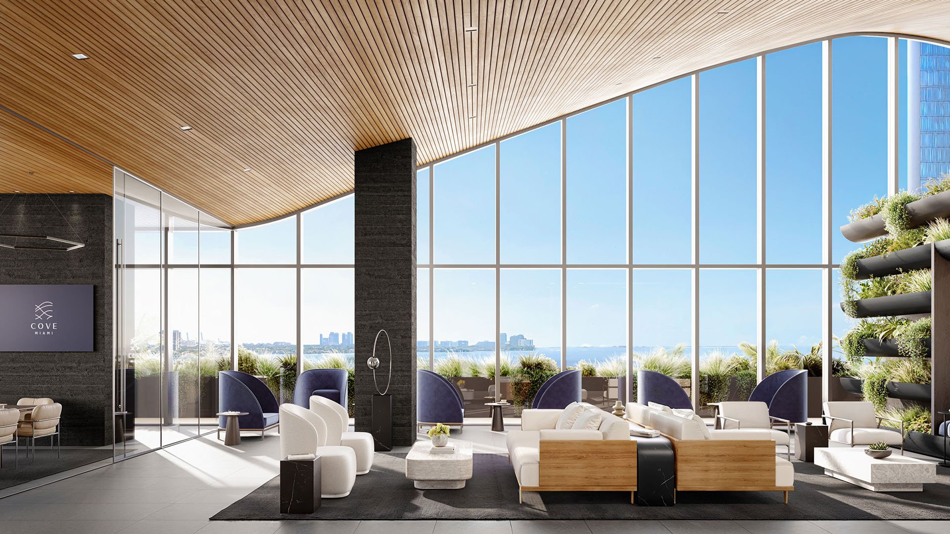 Cove Miami in Miami presents luxury and ultra luxury condos in preconstruction, featuring a double-height lounge with skyline and bay views, sculptural seating, and a living green wall.