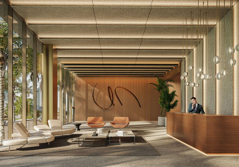 Cove Miami in Miami presents luxury and ultra luxury condos in preconstruction, featuring a grand lobby with a reception desk, sculptural wall art, lounge seating, and full-height glass along a palm-lined frontage.