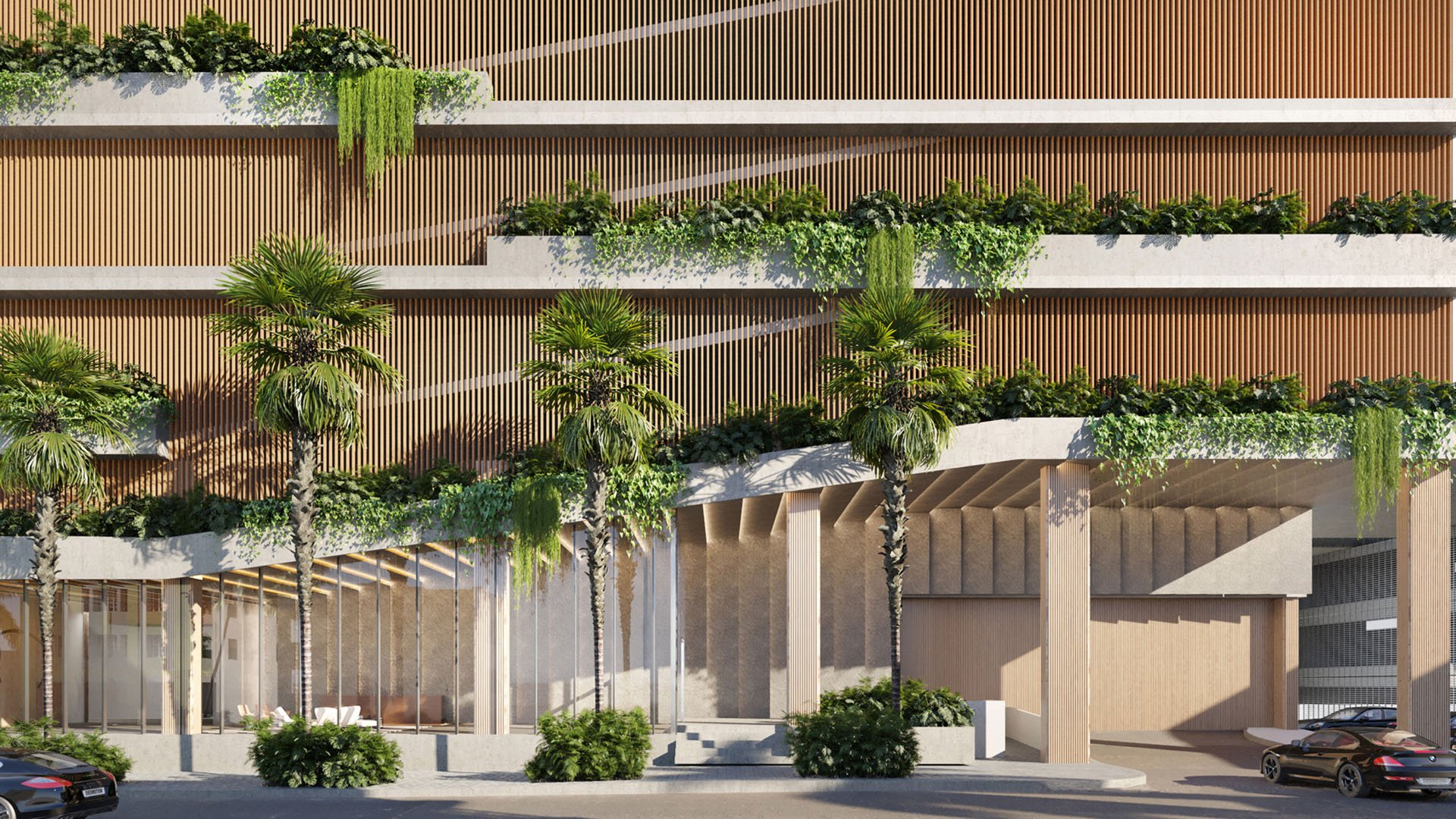 Cove Miami in Miami presents luxury and ultra luxury condos in preconstruction, featuring a landscaped condo entrance with layered podium terraces, tropical planting, and a sculpted arrival canopy.