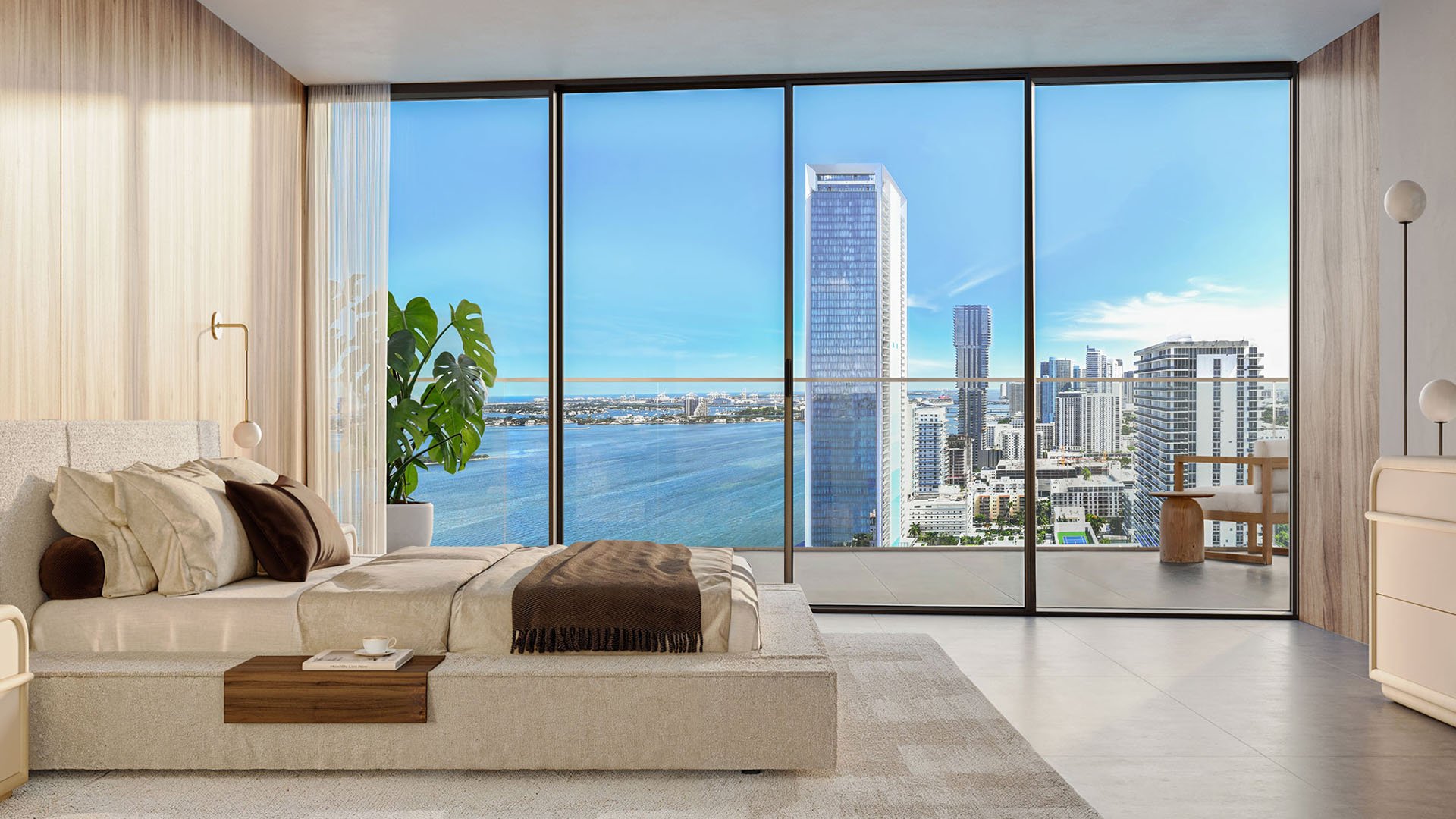Cove Miami in Miami presents luxury and ultra luxury condos in preconstruction, featuring a sunlit bedroom with floor-to-ceiling glass, a waterfront skyline, and wide bay views.