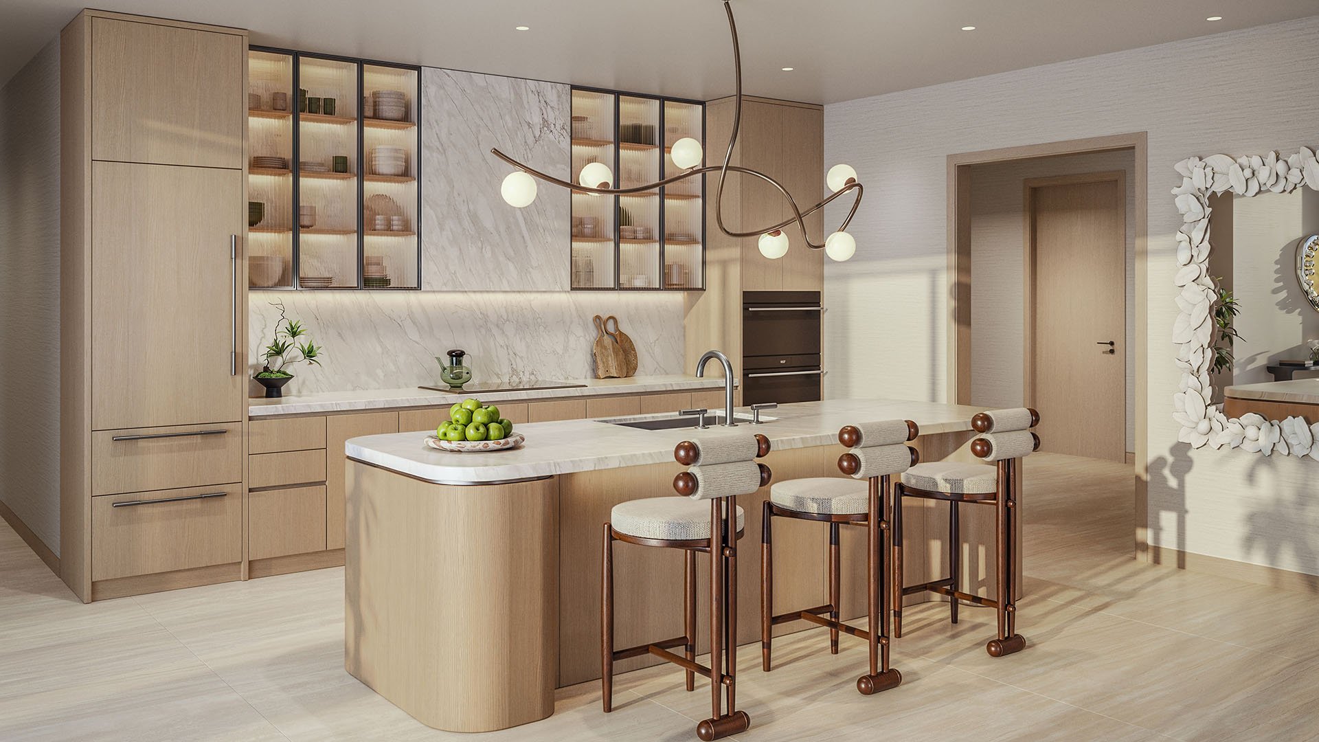 Chef kitchen at Delano Residences & Hotel, Miami, with a marble island, bar seating, warm wood cabinetry, and built-in appliances, showing luxury and ultra luxury preconstruction condos.