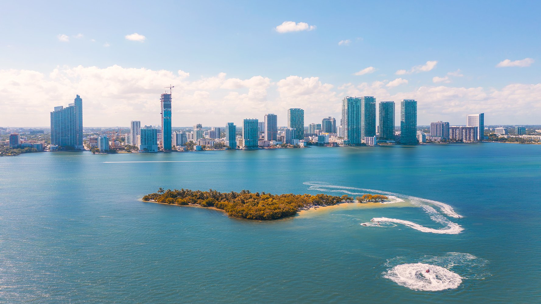 Edgewater, Miami waterfront cityscape on Biscayne Bay, parks and boardwalk—hotspot for luxury and ultra luxury condos, featuring preconstruction and resale.