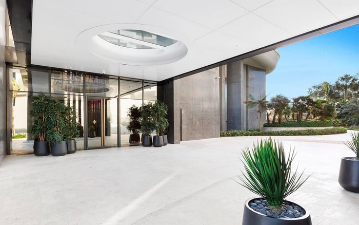 The Ritz-Carlton Residences® Sunny Isles or Faena House Miami Beach: Which Better Supports Buyers Who Want Beach Service without Constant Lobby Theater