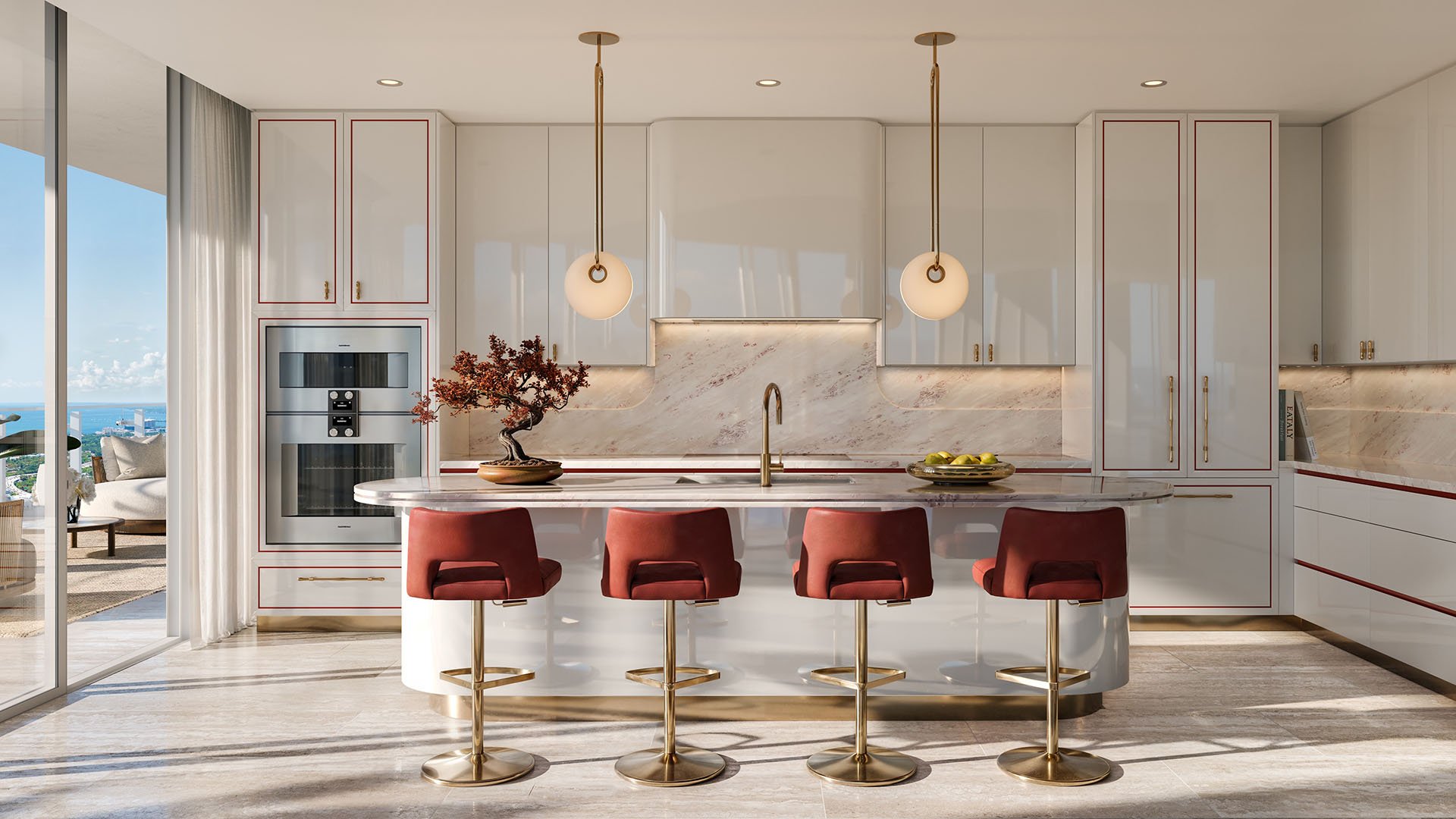 Faena Residences Miami South kitchen with curved island, marble backsplash, red bar stools and gold fixtures, Downtown Miami. Luxury and ultra luxury preconstruction condos with chef-grade appliances and bespoke cabinetry.