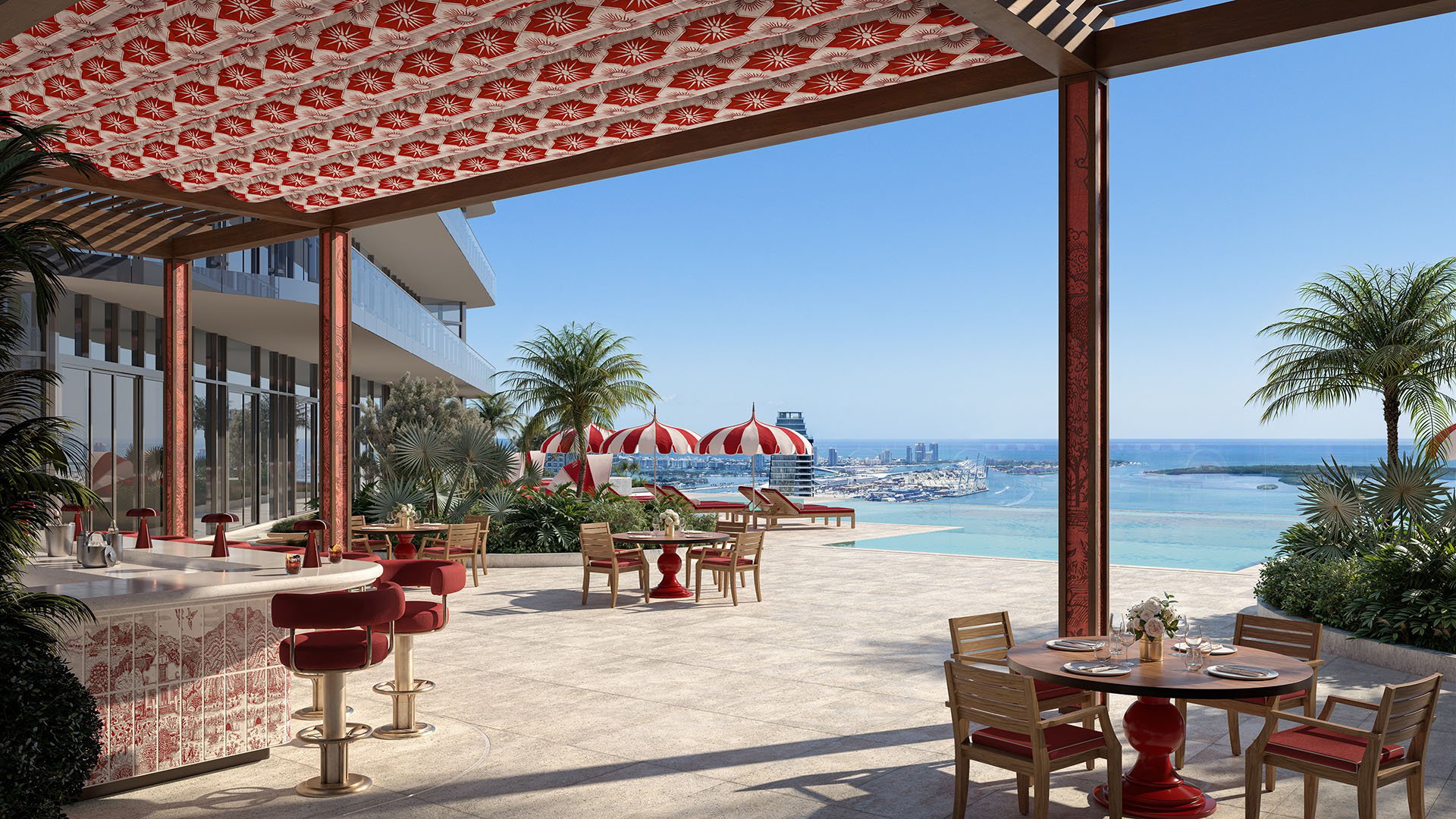 Faena Residences Miami Beach rooftop terrace with outdoor bar, dining tables and panoramic waterfront views, Downtown Miami. Luxury and ultra luxury preconstruction condos featuring elevated entertaining and hospitality spaces.
