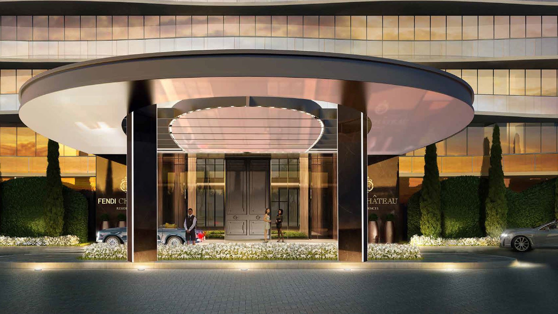 Front view of the circular porte cochere canopy at Fendi Chateau Residences in Surfside, framing the main entrance to these luxury and ultra luxury condos.