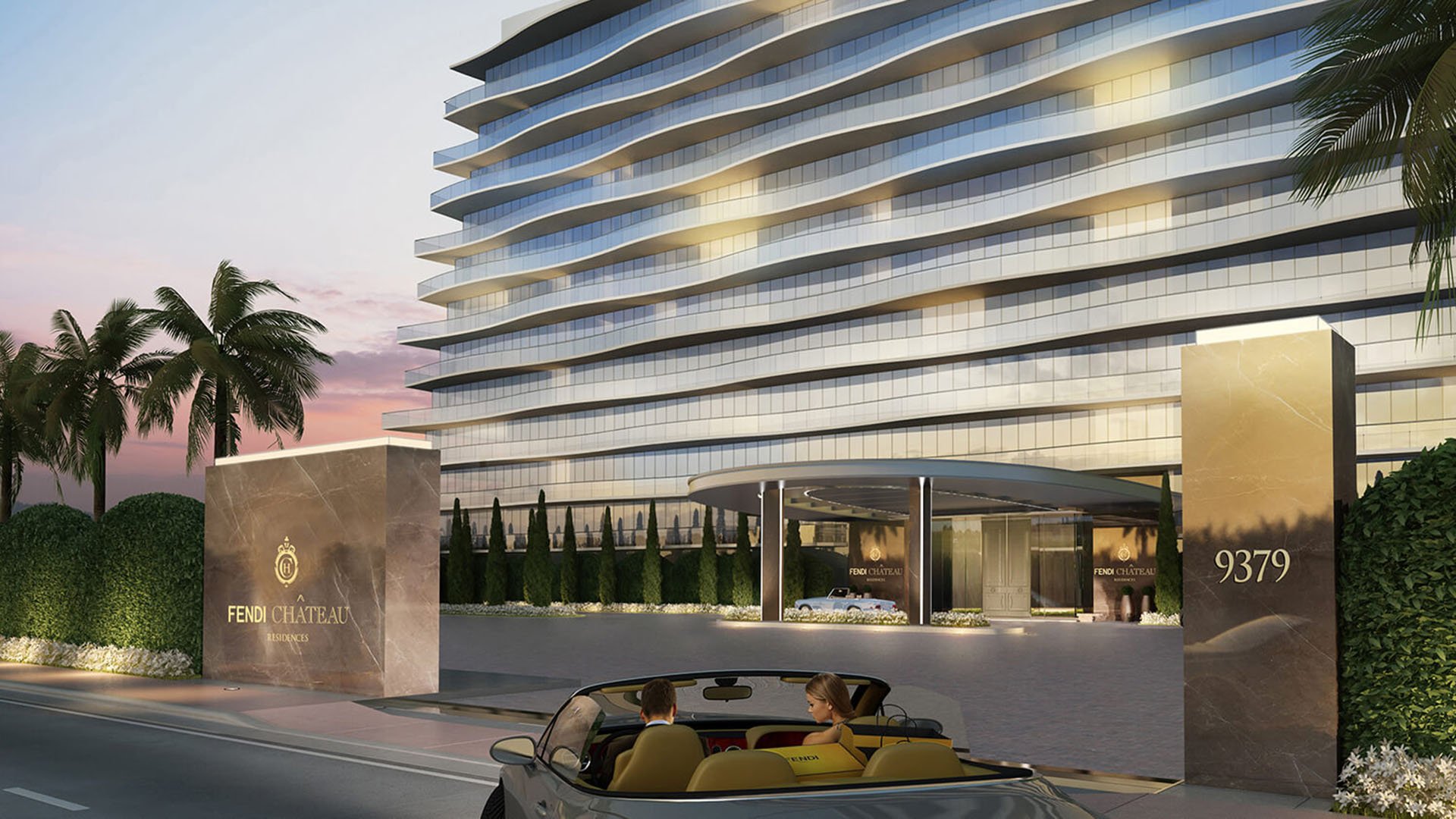 Streetfront entrance at Fendi Chateau Residences in Surfside with monument signs, porte cochere, and the wavy glass facade of luxury and ultra luxury condos.