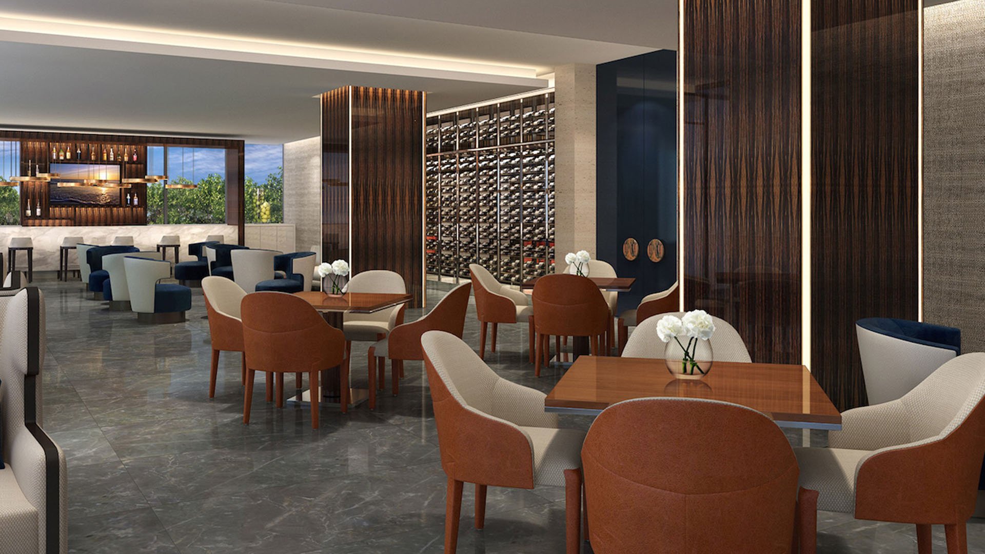 Wine lounge at Fendi Chateau Residences in Surfside with bar seating, tables, and a wall of bottles, adding a social amenity to luxury and ultra luxury condos.