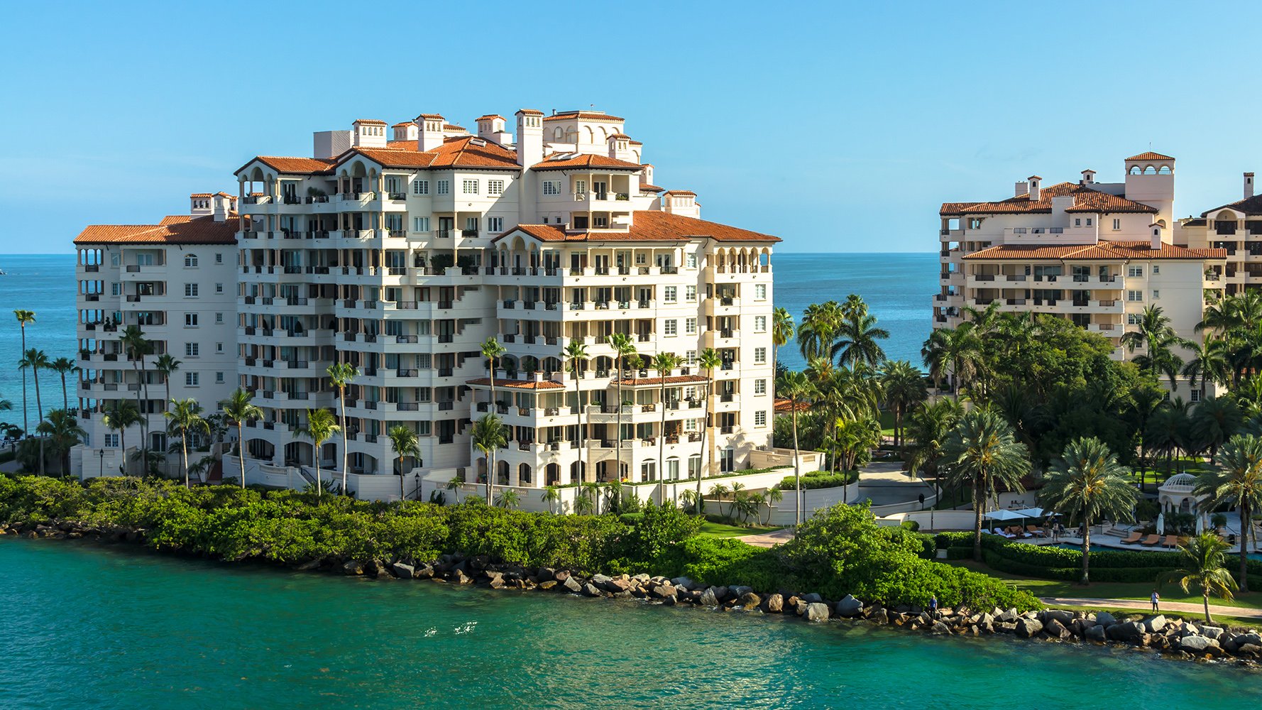 Fisher Island, Miami coastal apartment complex with ocean view—exclusive private‑island setting of luxury and ultra luxury condos; strong resale market.