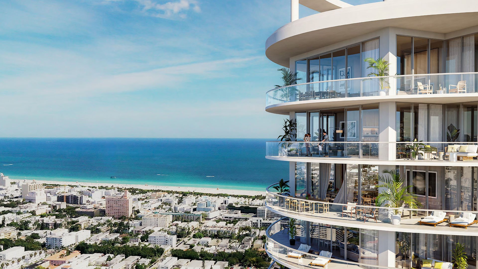 Curved tower exterior at Five Park in Miami Beach, luxury and ultra luxury condos with ocean views, glass balconies and the cityscape below.