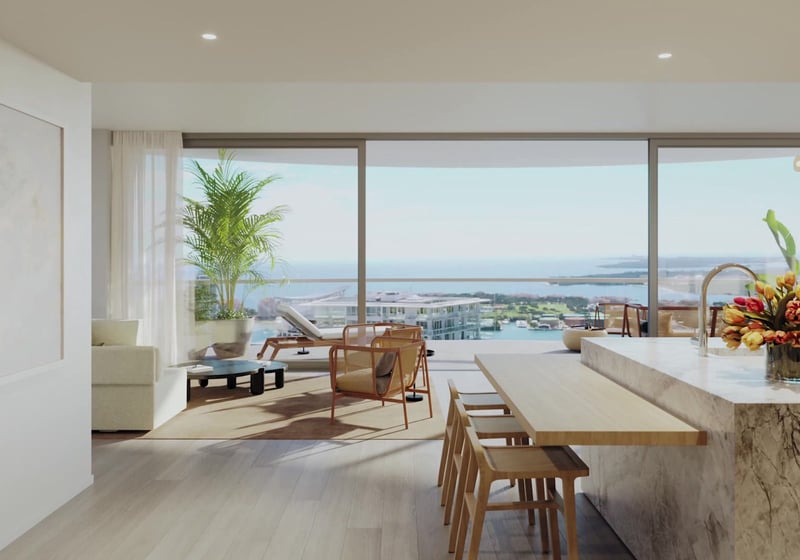 Entry view into the kitchen and terrace at Five Park in Miami Beach, luxury and ultra luxury condos with water views and a marble island.