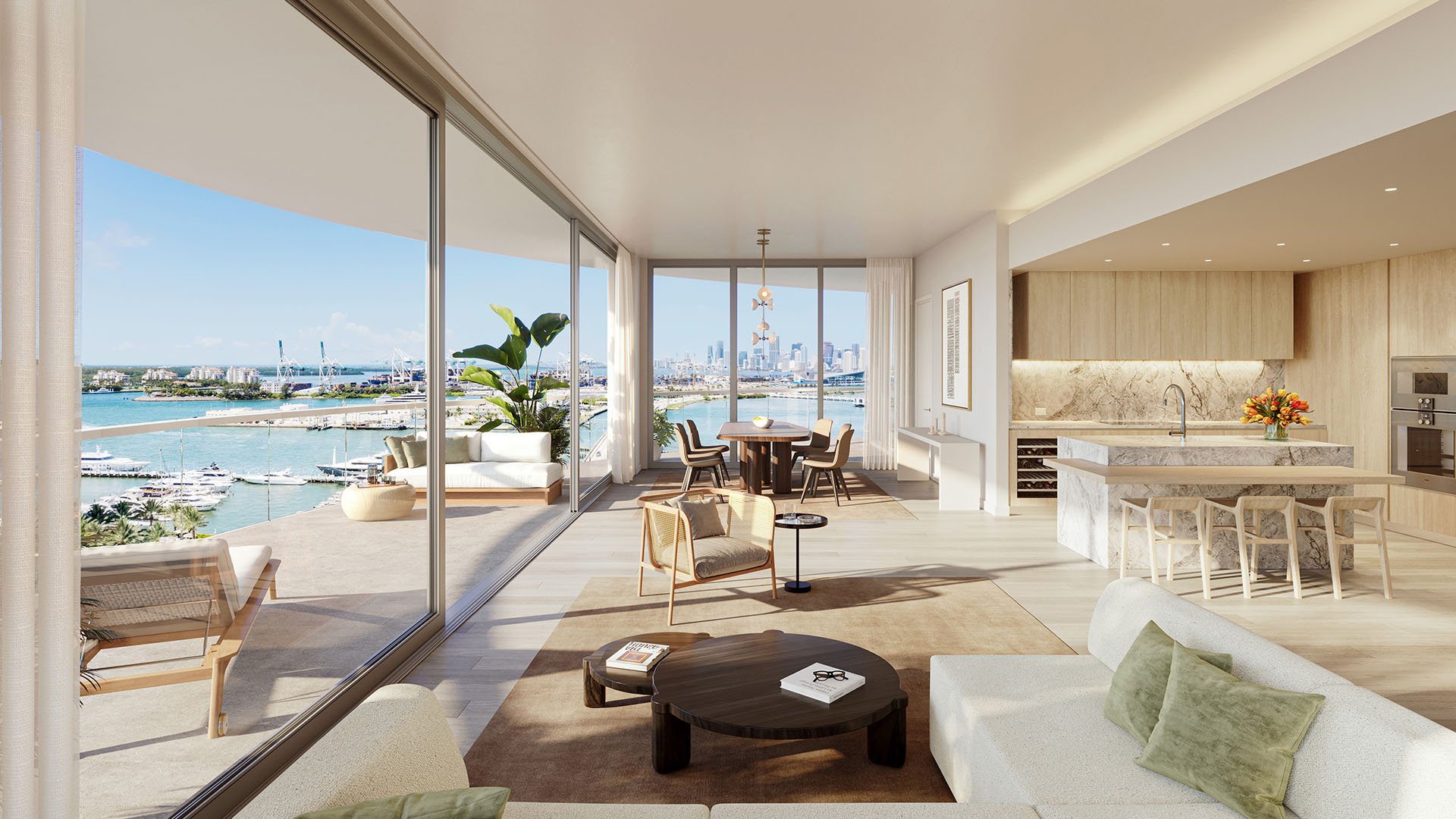 Great room at Five Park in Miami Beach, luxury and ultra luxury condos with a chef kitchen, bay views and a sliding wall opening to the terrace.