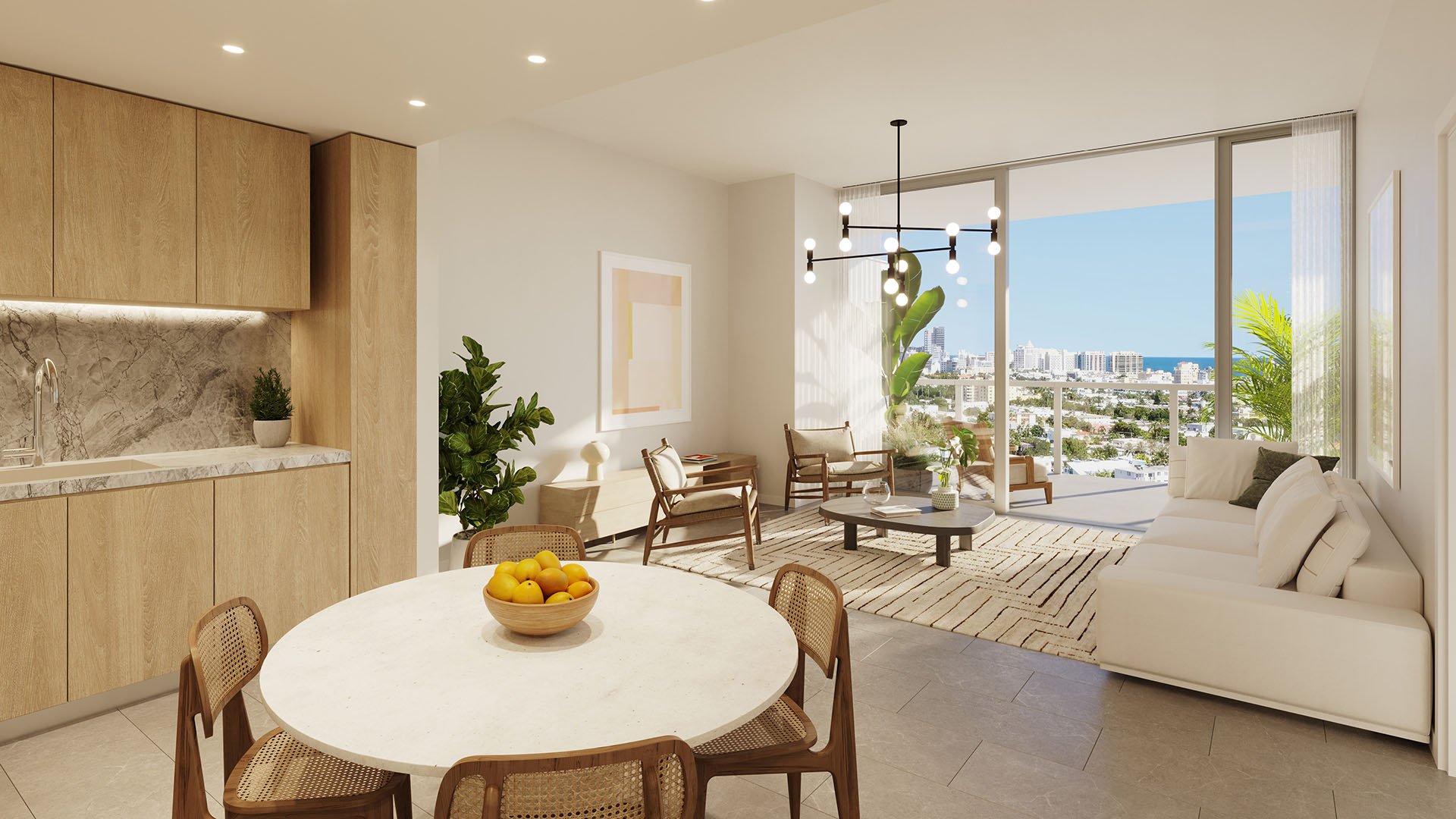 Living room and round dining area at Five Park in Miami Beach, luxury and ultra luxury condos with city views and a calm neutral palette.