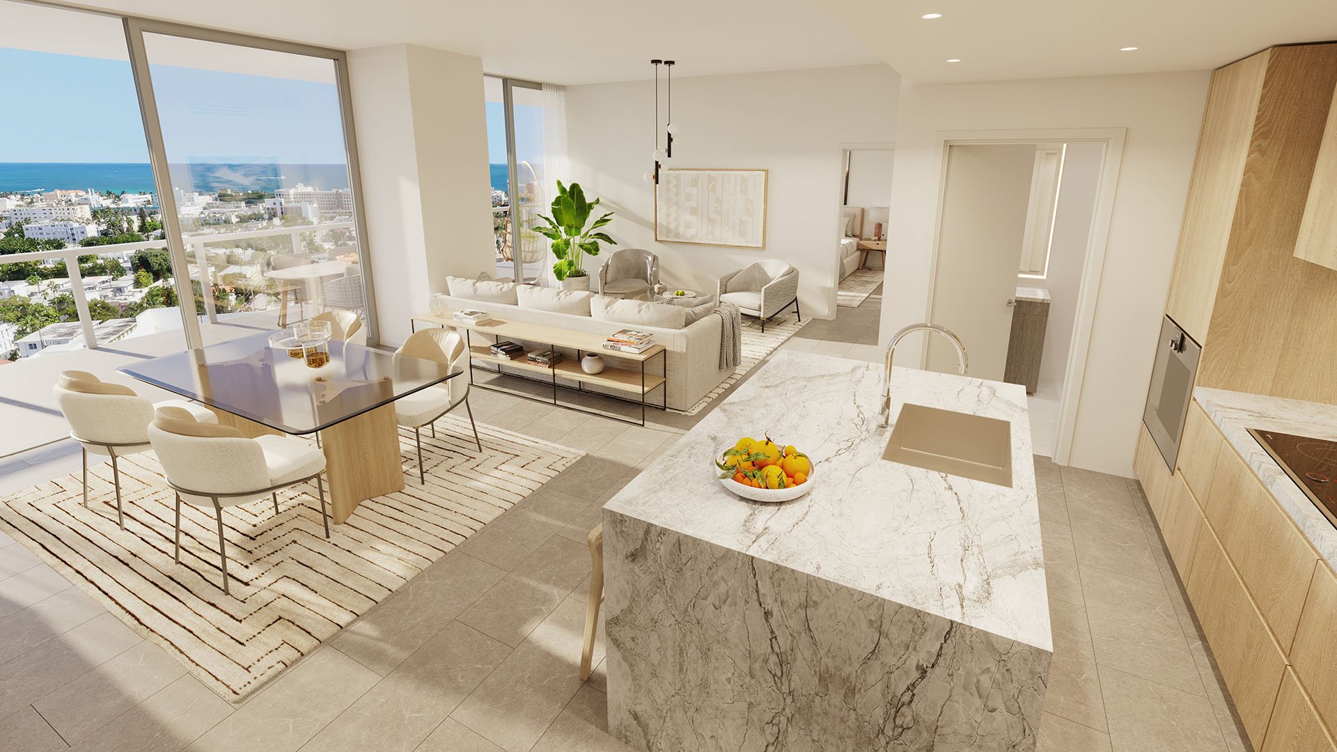 Open plan kitchen, dining and living room at Five Park in Miami Beach, luxury and ultra luxury condos with broad city and ocean views.