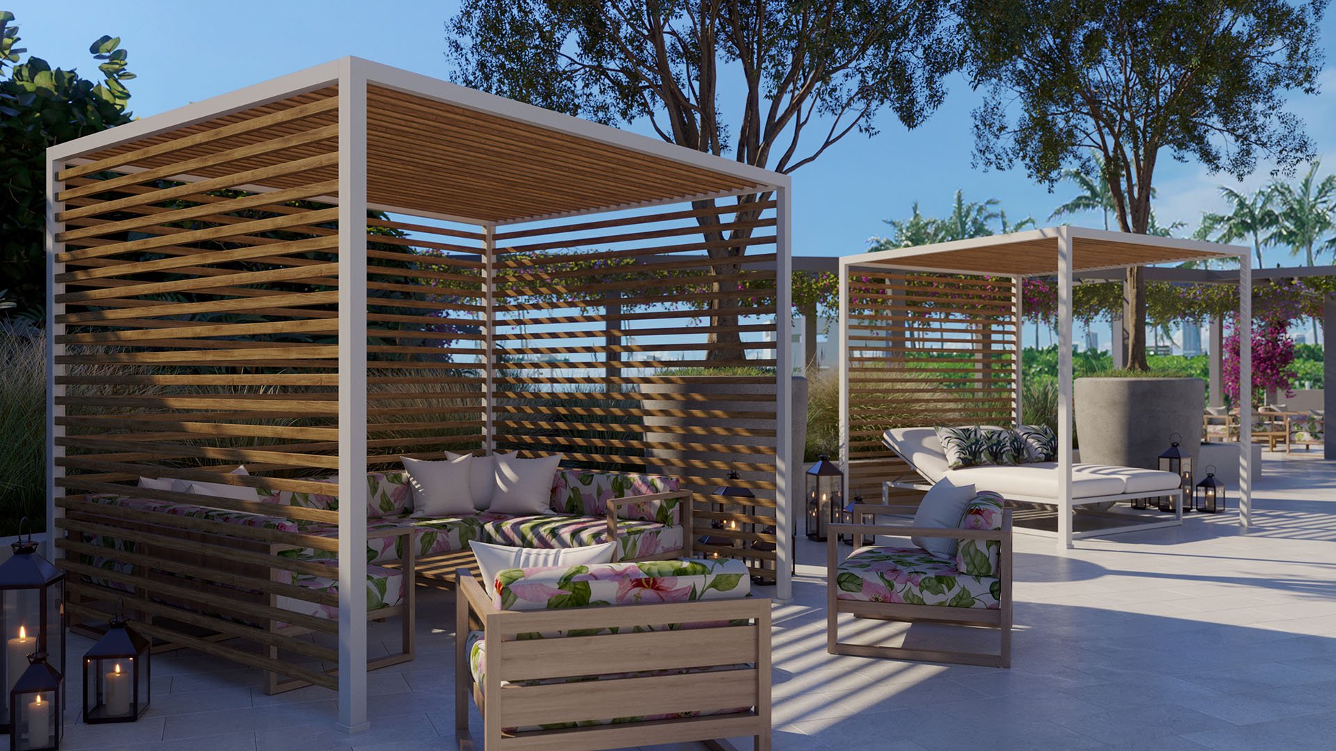 Pool deck cabanas at Five Park in Miami Beach, luxury and ultra luxury condos with wood pergolas, cushioned loungers and a resort style outdoor lounge.