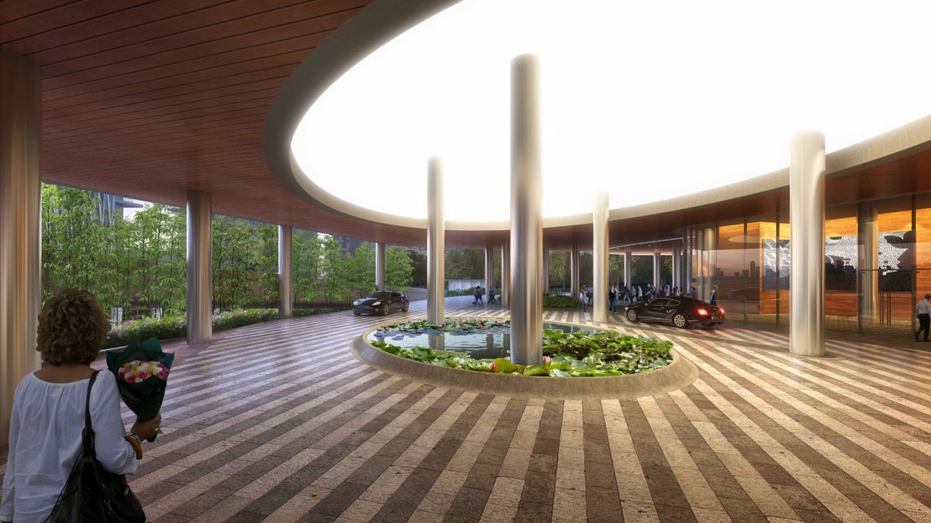 Sweeping porte cochere canopy at Five Park in Miami Beach, luxury and ultra luxury condos with sculptural columns and a circular landscaped center.