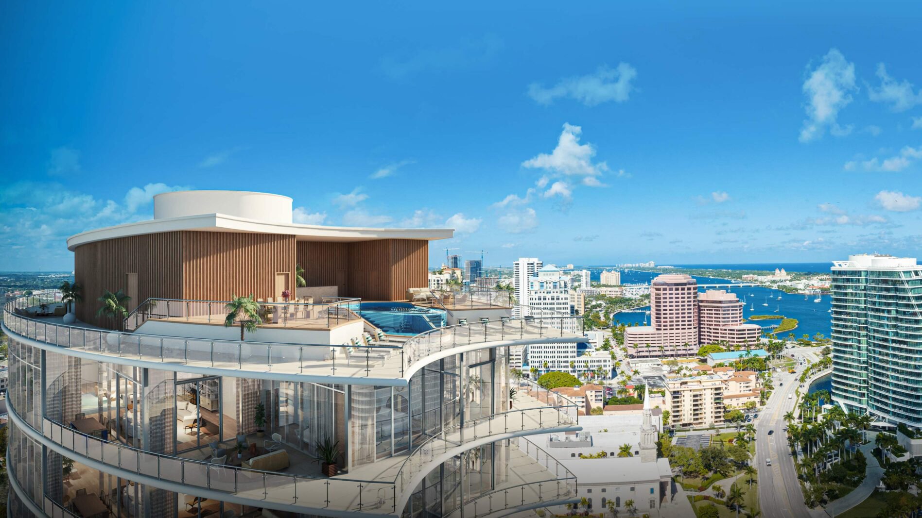 Rooftop infinity pool at Forte on Flagler in West Palm Beach with panoramic city skyline, showcasing ultra luxury preconstruction condos.