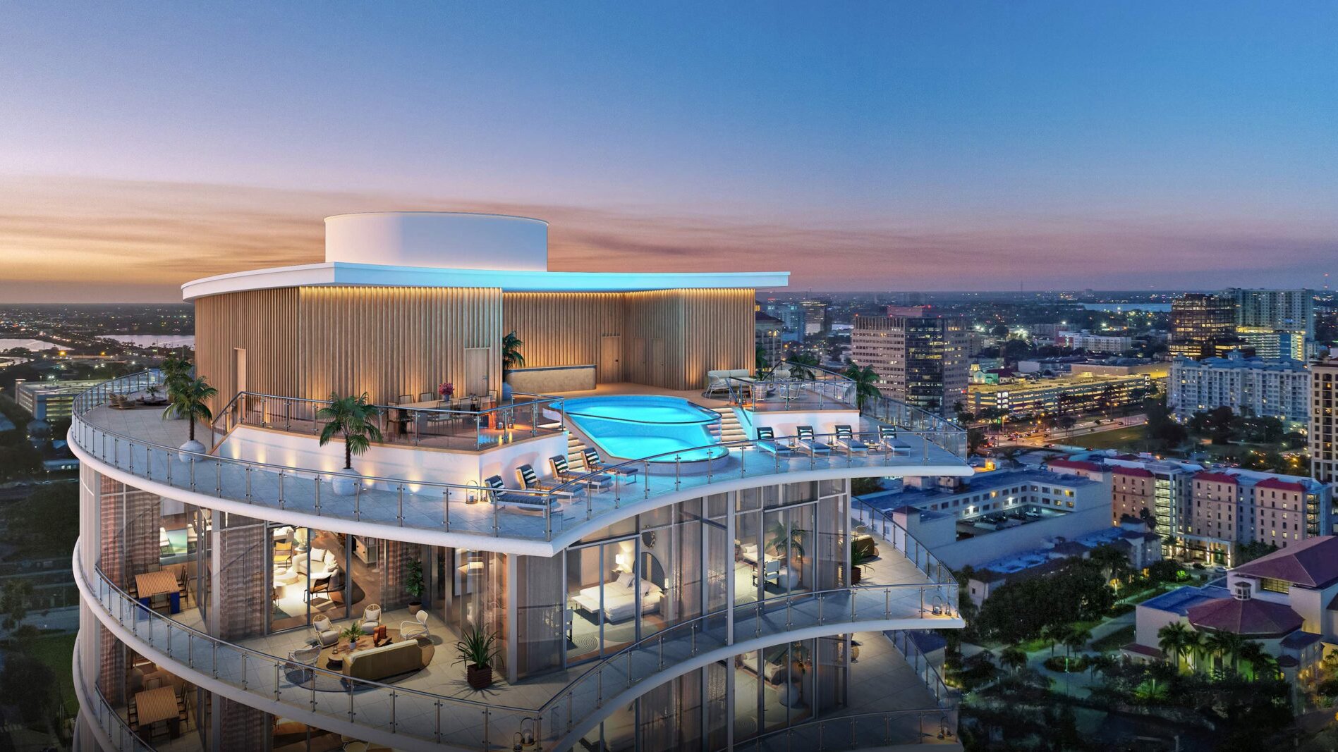 Sunset rooftop pool view at Forte on Flagler, West Palm Beach, capturing luxury condo lifestyle and coastal city vistas.