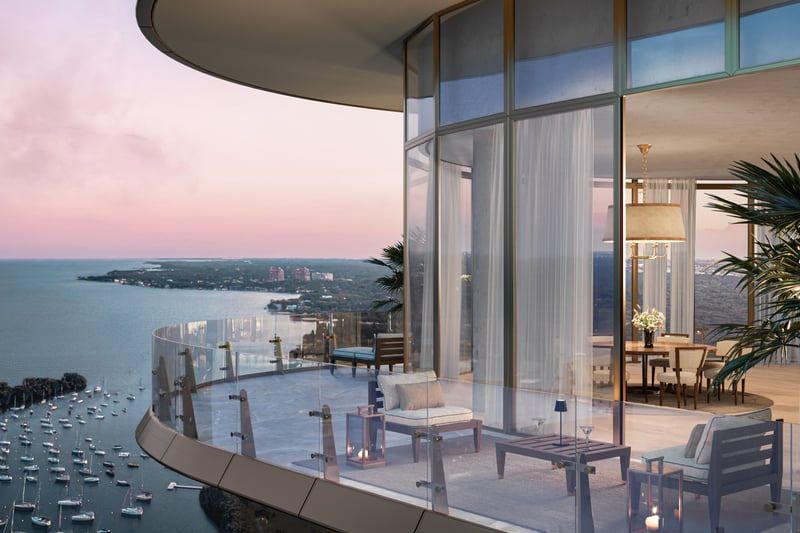 Four Seasons Coconut Grove balcony with ocean view at sunset, indoor‑outdoor living for luxury and ultra luxury condos; preconstruction in Coconut Grove, Miami.
