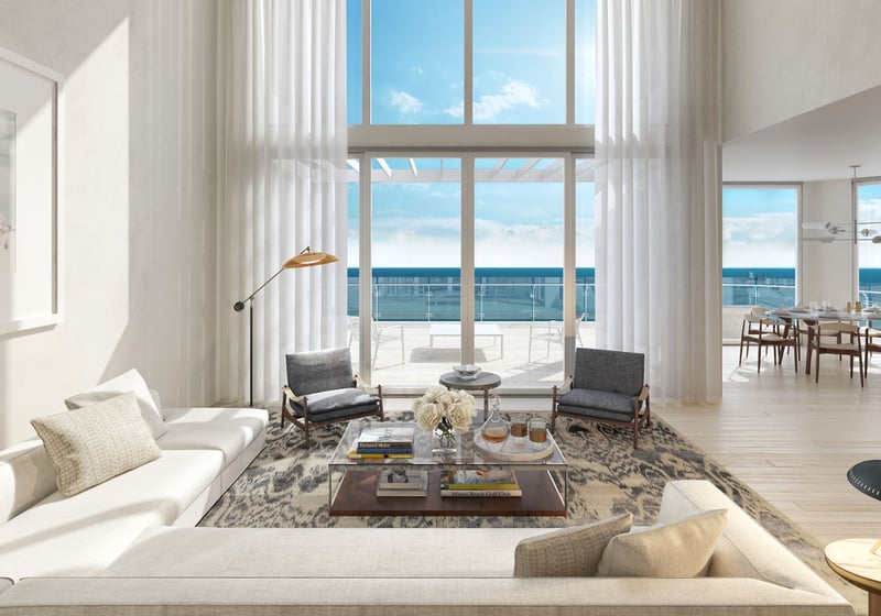 Double-height great room with an ocean terrace and adjacent dining area at Four Seasons Residences Fort Lauderdale in Fort Lauderdale, illustrating luxury and ultra luxury condos with expansive indoor-outdoor living.