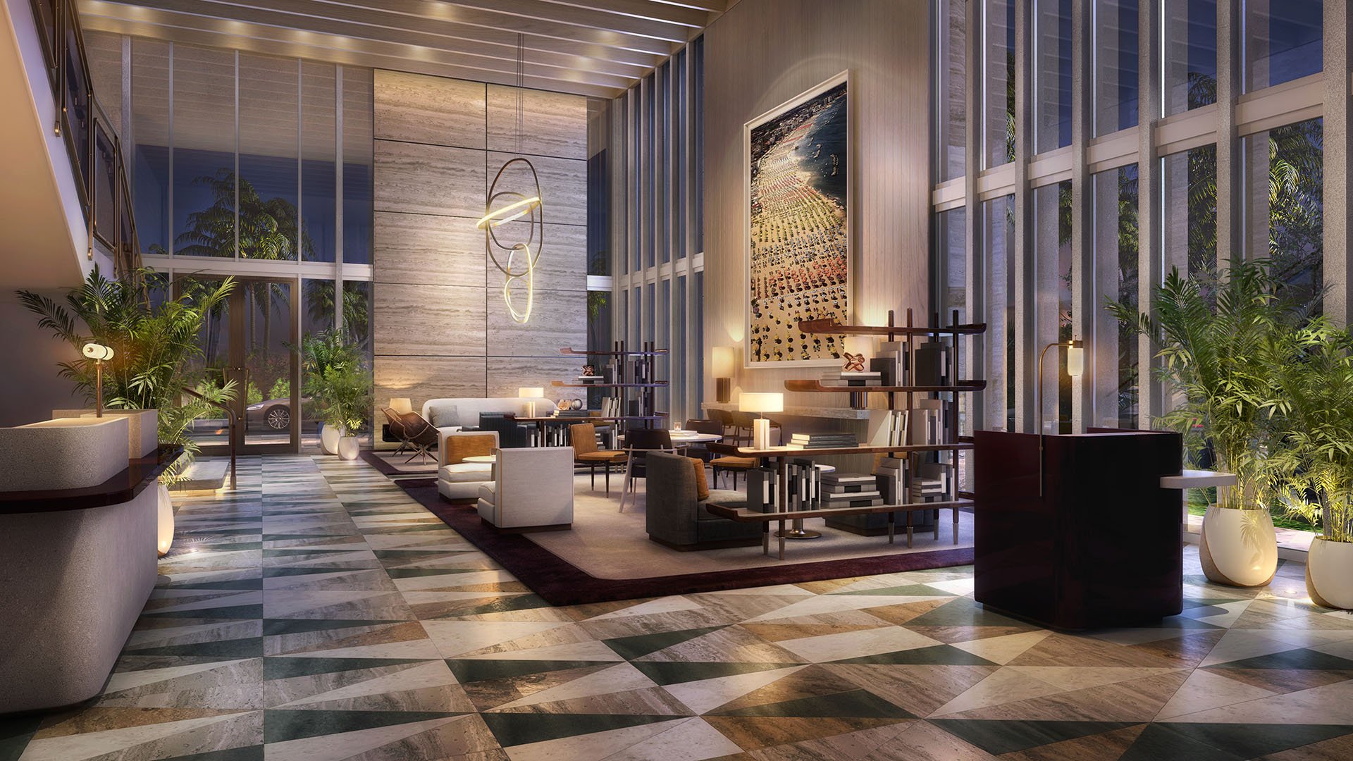 Double-height lobby lounge at twilight with sculptural lighting and lofty glazing at Four Seasons Residences Fort Lauderdale in Fort Lauderdale, introducing luxury and ultra luxury condos with a dramatic arrival experience.