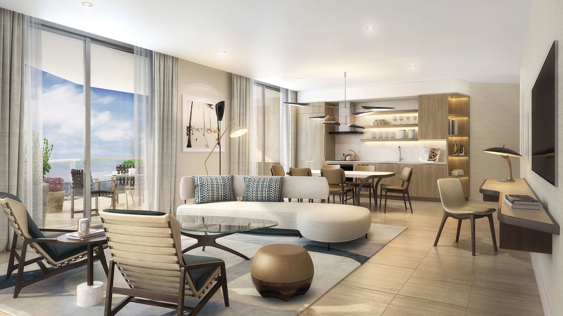 Open-plan living, dining, and kitchen space opening to a terrace at Four Seasons Residences Fort Lauderdale in Fort Lauderdale, illustrating luxury and ultra luxury condos with airy contemporary interiors.