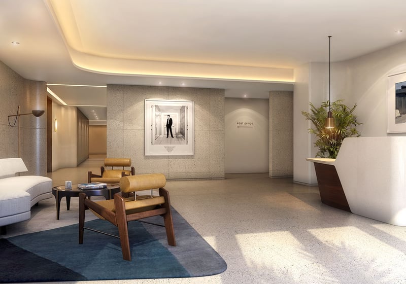 Post office lounge reception with a curved desk, seating area, and soft lighting at Four Seasons Residences Fort Lauderdale in Fort Lauderdale, presenting luxury and ultra luxury condos with polished service amenities.