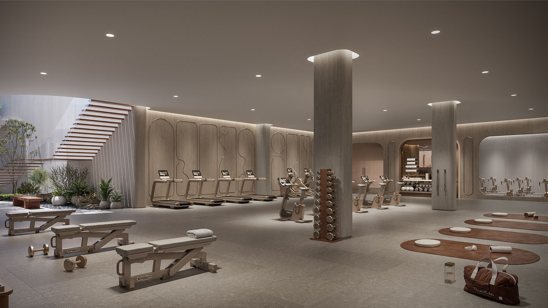 Fitness studio at Frida Kahlo Residences in Wynwood, designed for luxury and ultra luxury condos living with treadmills, bikes, strength benches, and an open area for stretching and yoga.