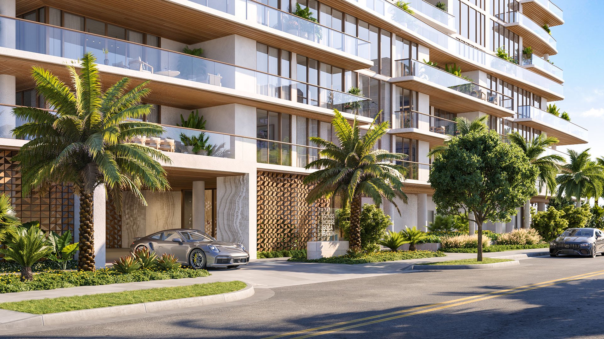 Glass House Boca Raton street-level porte cochere and palm-lined entrance, showcasing luxury and ultra luxury preconstruction condos arrival experience in Boca Raton, Florida.