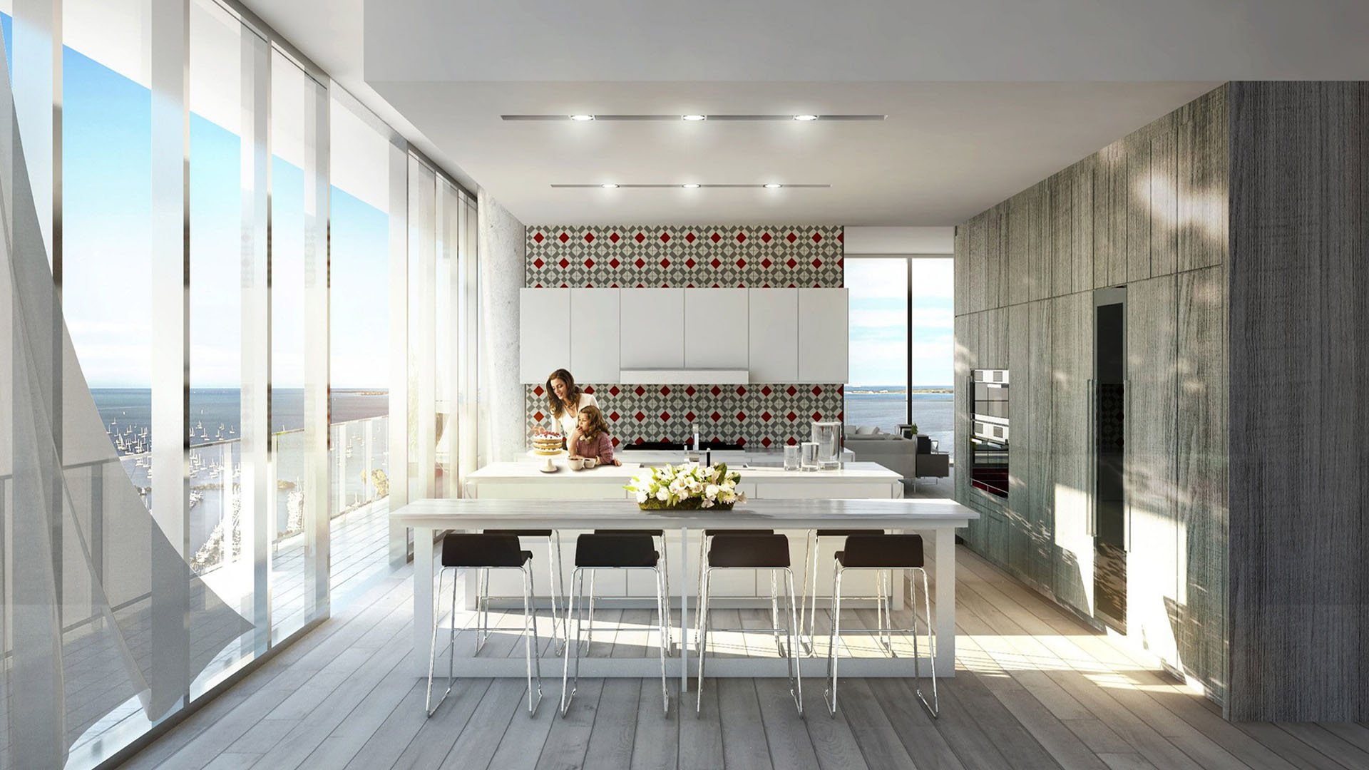 Grove at Grand Bay, Coconut Grove luxury and ultra luxury condos with an eat-in chef kitchen, long island, floor-to-ceiling windows, patterned backsplash, and open water views.