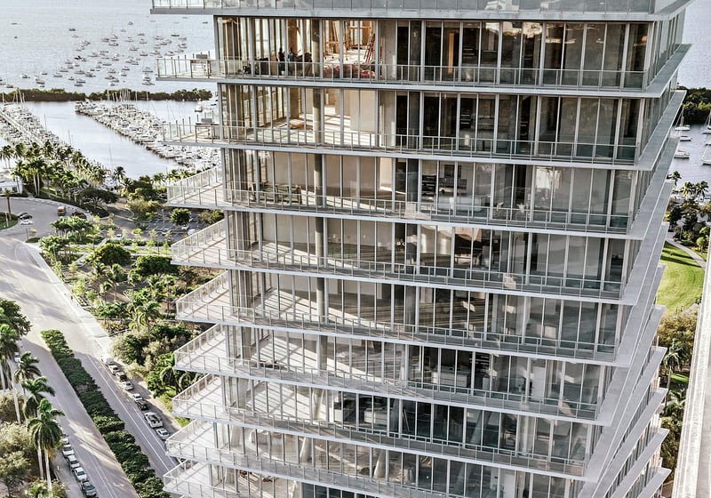 Grove at Grand Bay, Coconut Grove luxury and ultra luxury condos with a close aerial view of glass balconies and expansive corner terraces overlooking the marina and waterfront road.