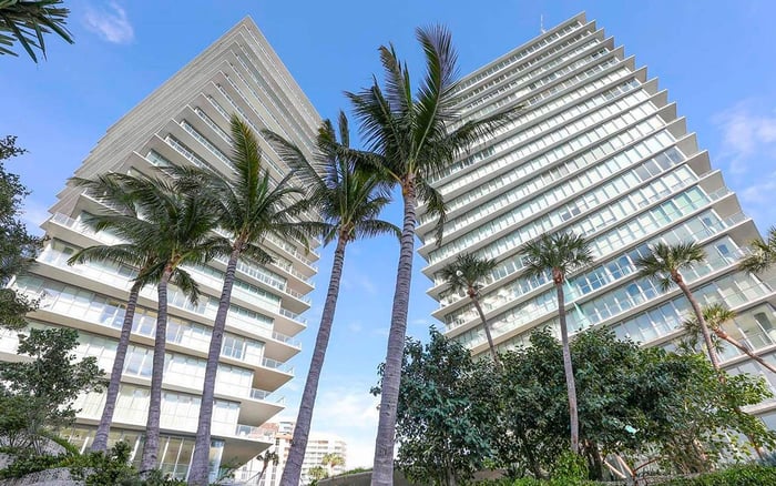 Comparing The Tropical Modernism Of Grove at Grand Bay Against The Minimalist Lines Of Park Grove Coconut Grove