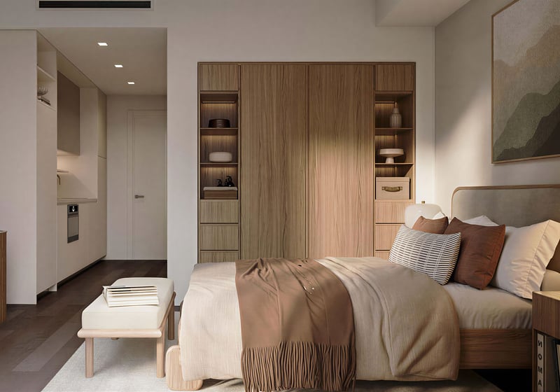 Warm bedroom suite interior at House of Wellness in Brickell preconstruction luxury and ultra luxury condos with built-in shelving, wood paneling, and a compact kitchenette beyond.