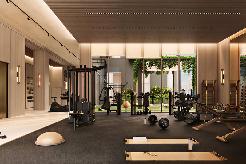 Fitness center at House of Wellness in Brickell preconstruction luxury and ultra luxury condos with strength machines, free weights, mats, and floor-to-ceiling windows.