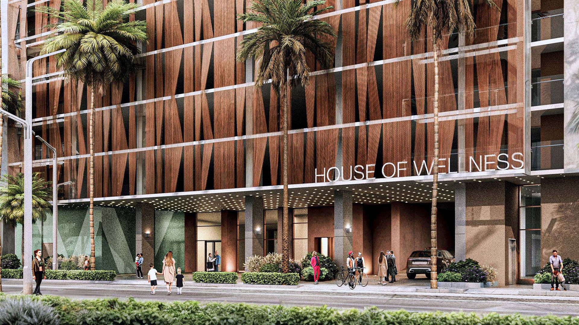 Palm-lined street entrance for House of Wellness in Brickell preconstruction luxury and ultra luxury condos with the branded facade, canopy, and arrival area.