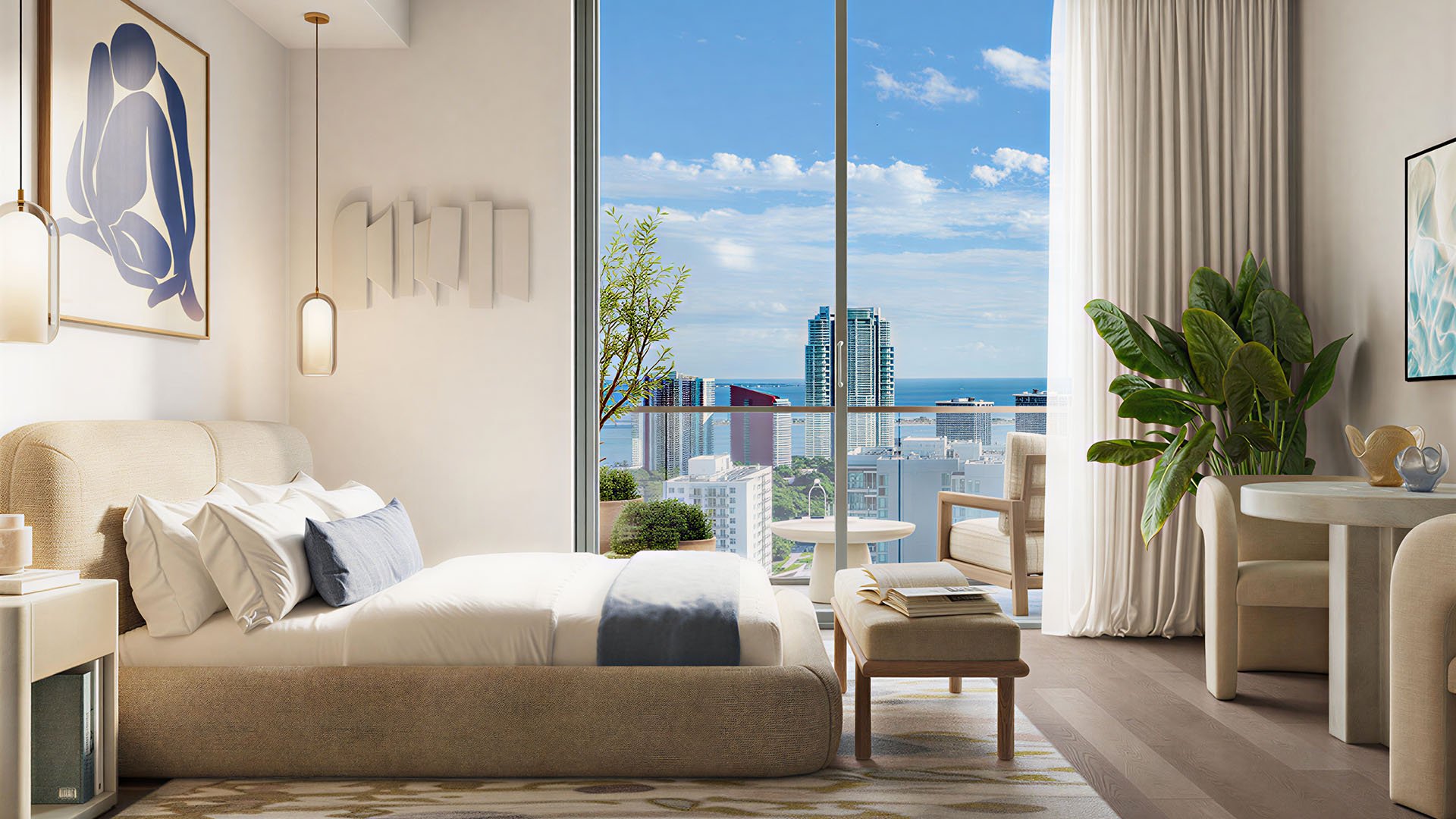 Primary bedroom at House of Wellness in Brickell preconstruction luxury and ultra luxury condos with balcony seating, a dining nook, and open water views.
