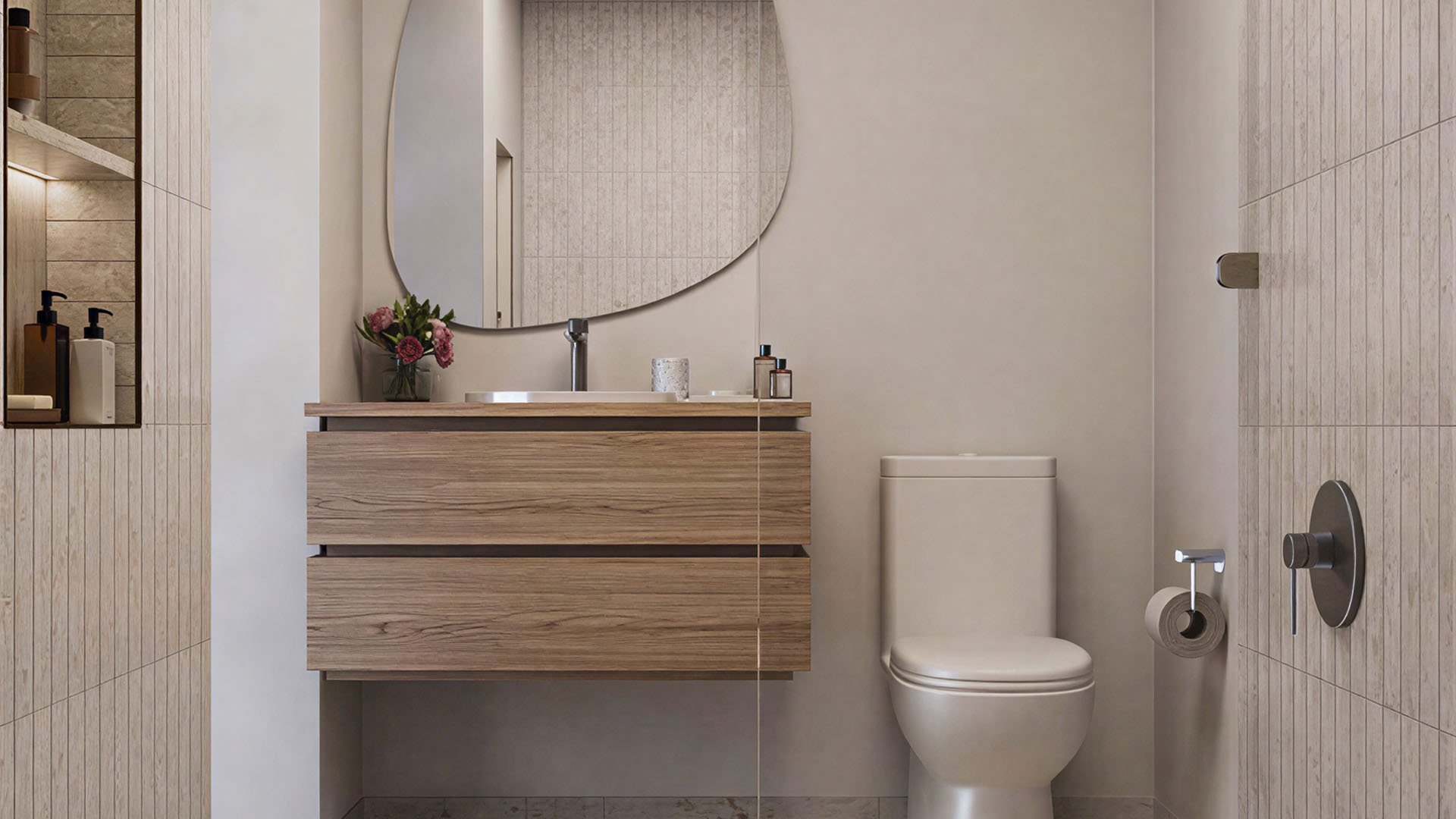Spa bathroom at House of Wellness in Brickell preconstruction luxury and ultra luxury condos with a wood vanity, sculptural mirror, glass shower, and neutral tile.