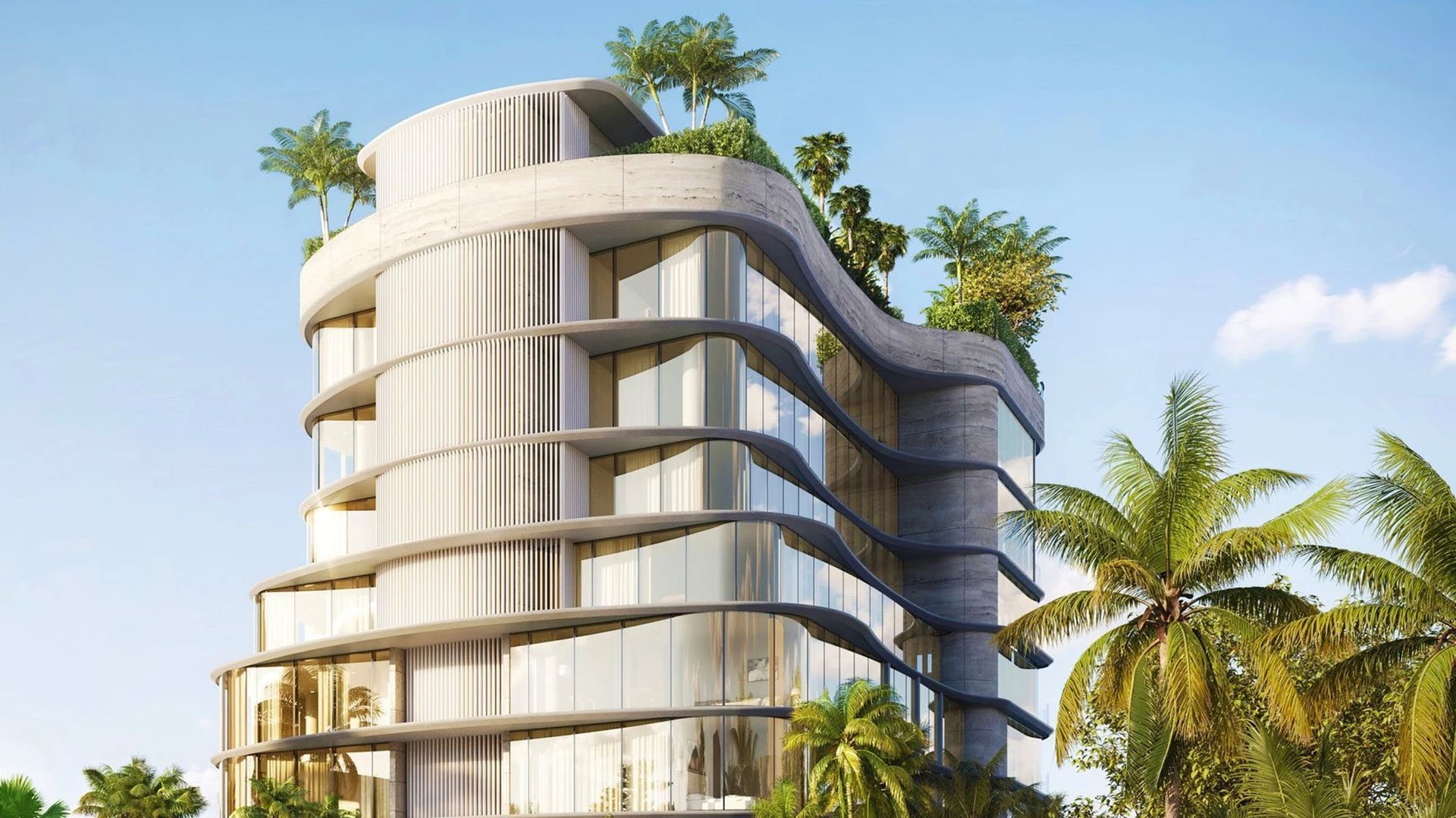 Indian Creek Residences and Yacht Club iconic curved waterfront tower exterior with wraparound glass and rooftop gardens, Bay Harbor Islands, Miami area, Florida, luxury and ultra luxury preconstruction condos architecture.