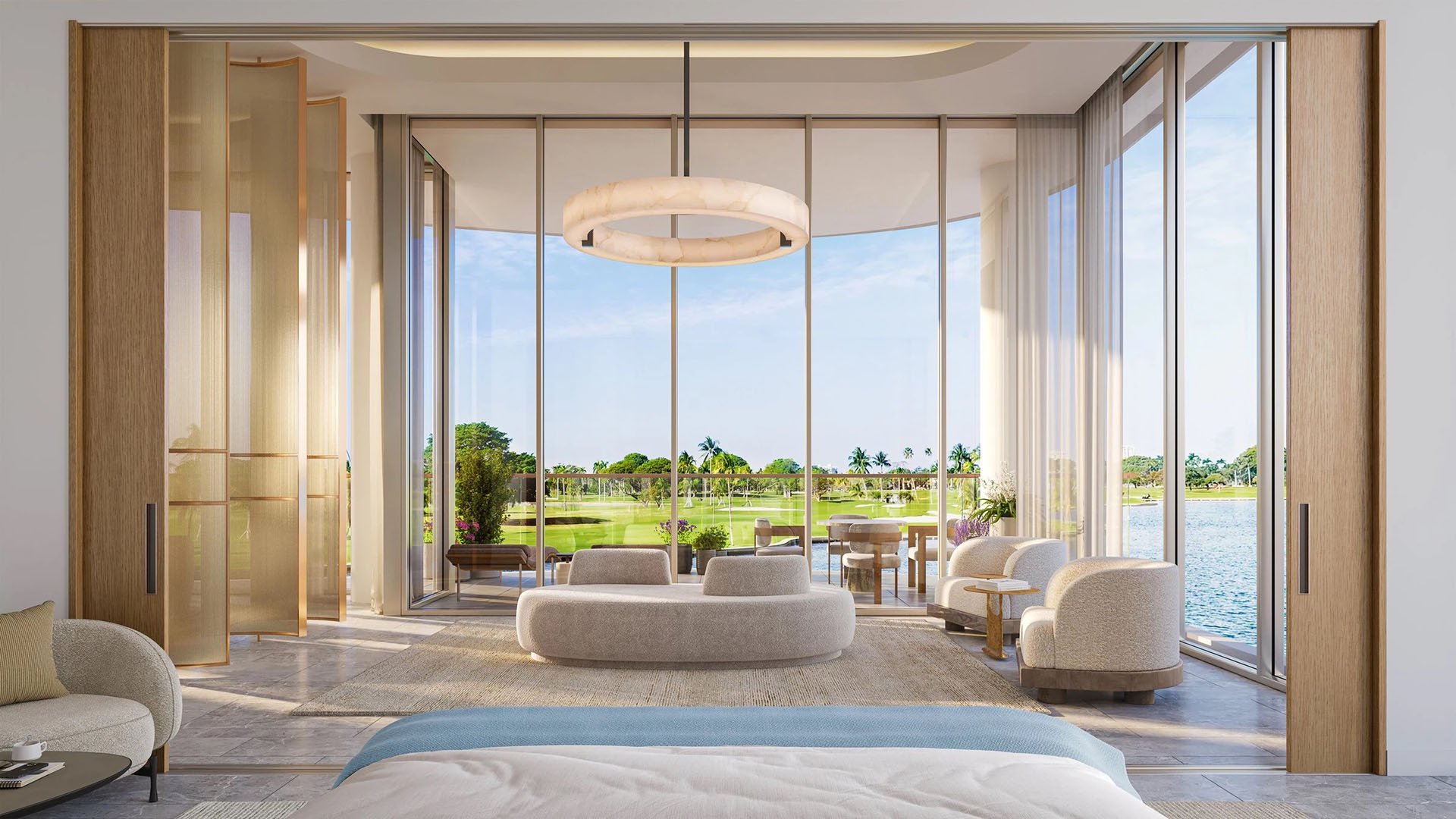 Indian Creek Residences and Yacht Club penthouse primary suite bedroom with floor-to-ceiling windows opening to terrace with golf course and water views, Bay Harbor Islands, Miami area, Florida, luxury and ultra luxury preconstruction condos.