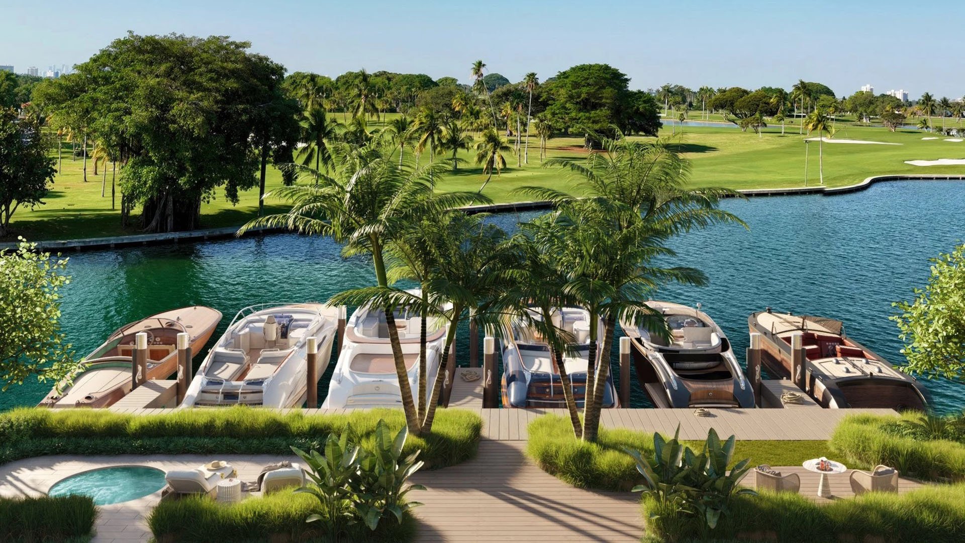 Indian Creek Residences and Yacht Club private marina with yacht slips, dock and tropical landscaping facing golf course, Bay Harbor Islands, Miami area, Florida, luxury and ultra luxury preconstruction condos waterfront lifestyle.