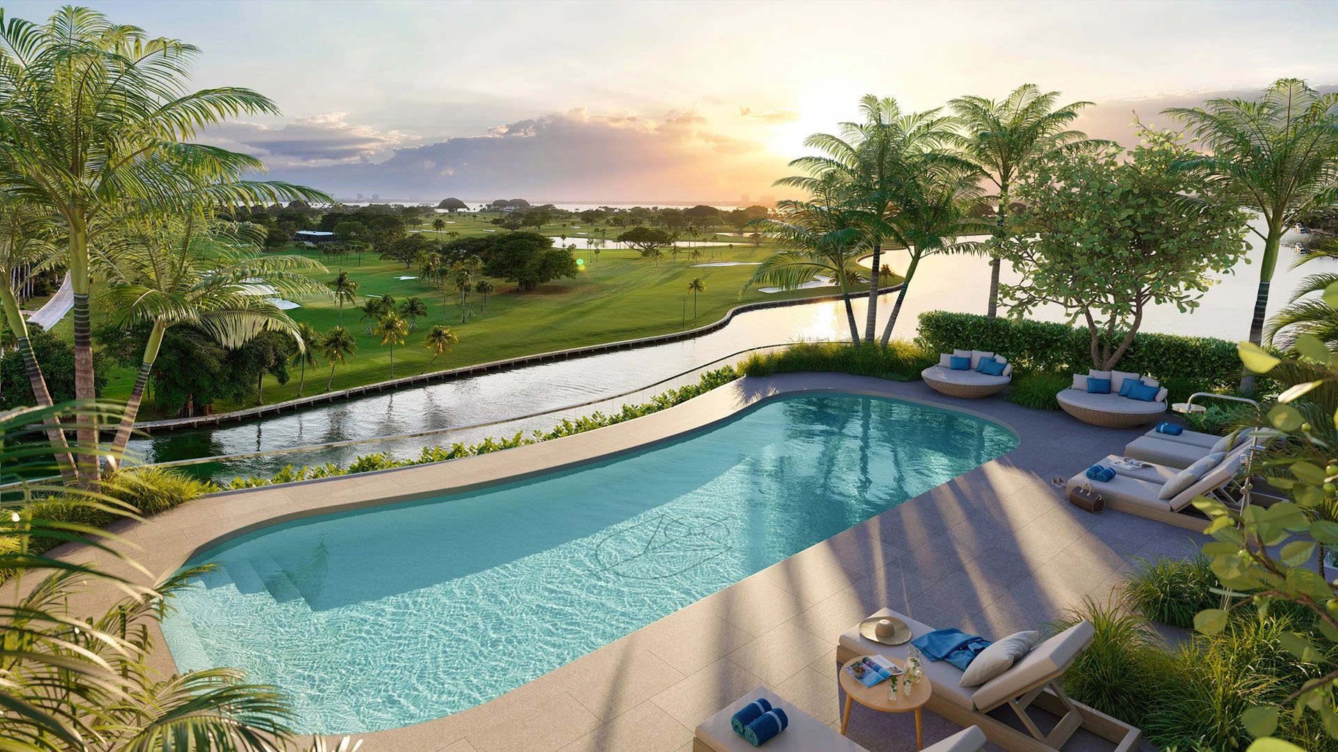 Indian Creek Residences and Yacht Club rooftop infinity pool at sunset, overlooking the golf course and waterway in Bay Harbor Islands, Miami, Florida, showcasing luxury and ultra luxury preconstruction condos with sun loungers and palms.