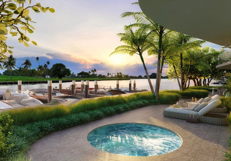 Indian Creek Residences and Yacht Club Bay Harbor Islands, Miami, Florida sunset spa pool terrace overlooking marina yachts, with lounge seating and tropical landscaping, amenities for luxury and ultra luxury preconstruction condos.