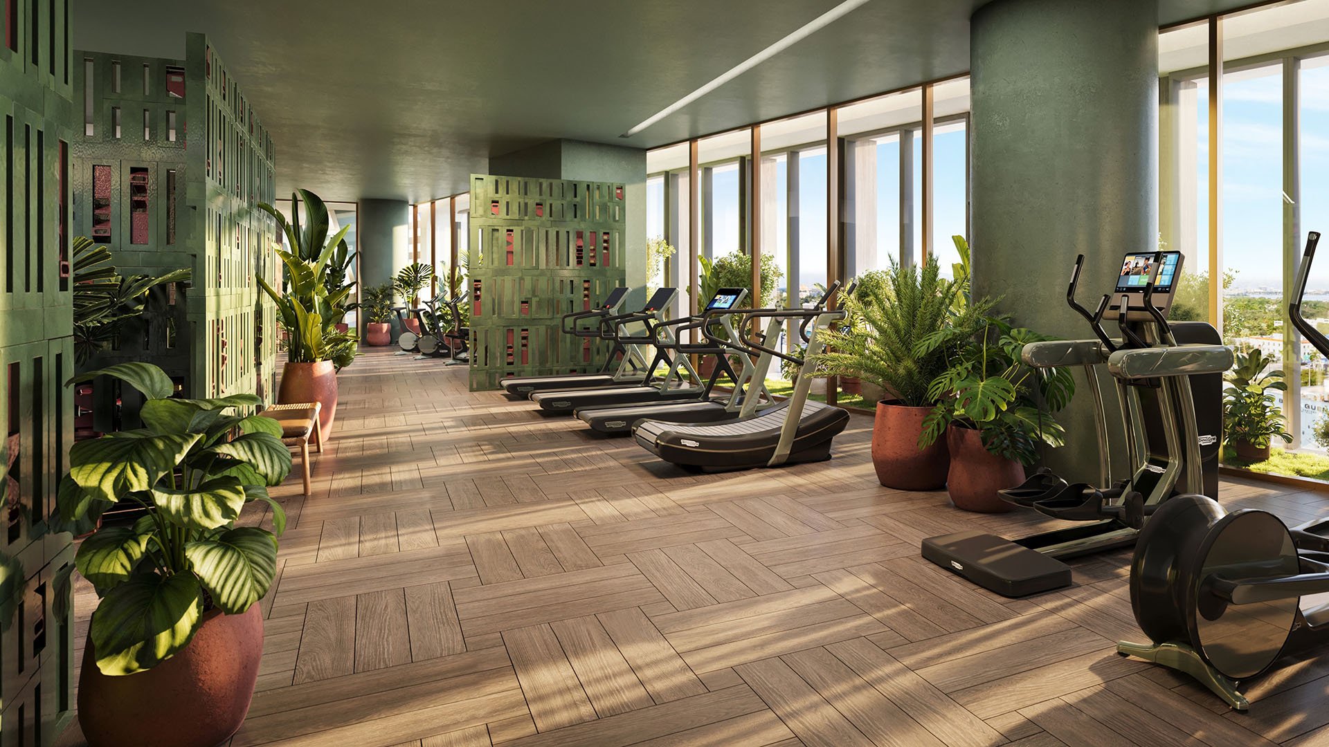 Jean-Georges Miami Tropic Residences fitness center with treadmills, cardio equipment, tropical plants and floor-to-ceiling windows, Miami, Florida, showcasing luxury and ultra luxury preconstruction condos with wellness amenities.