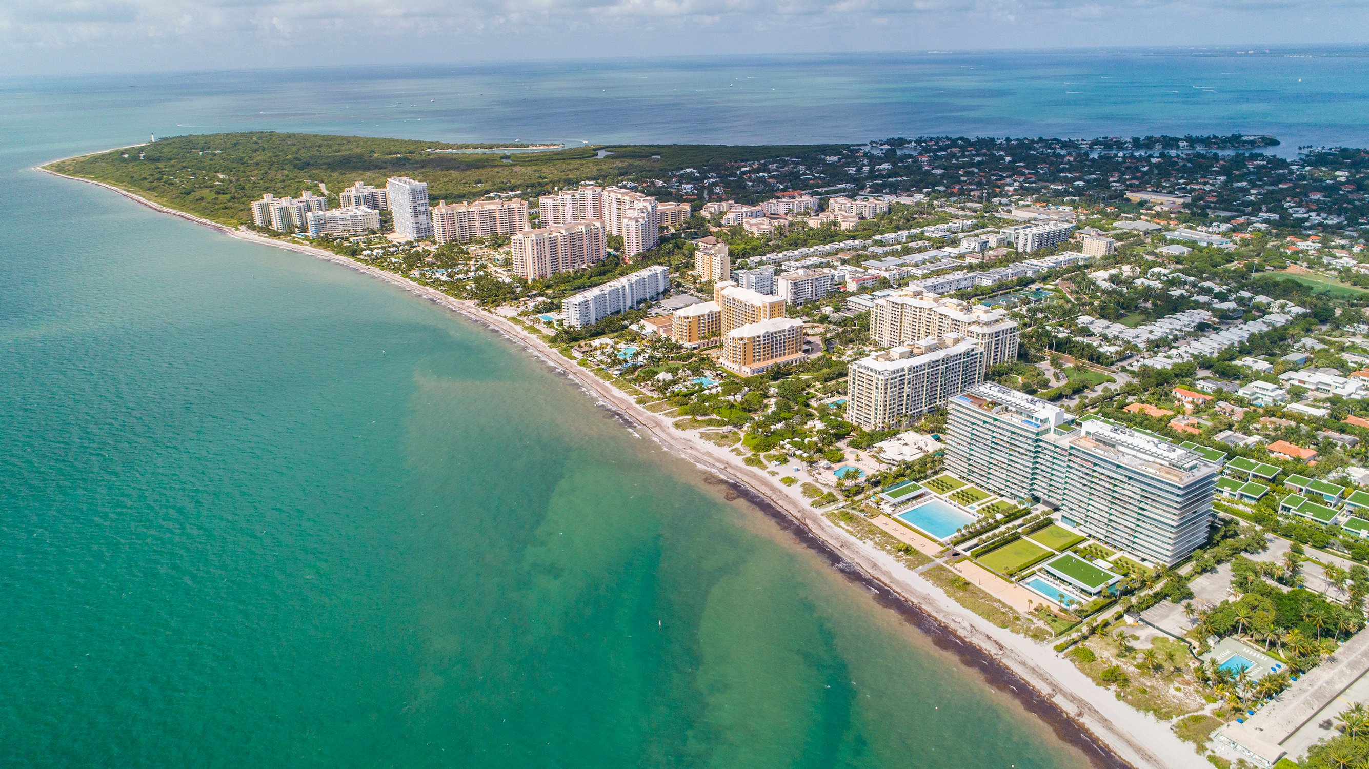 Key Biscayne luxury beachfront homes near Miami with ocean views and private island lifestyle. Featuring 2025.