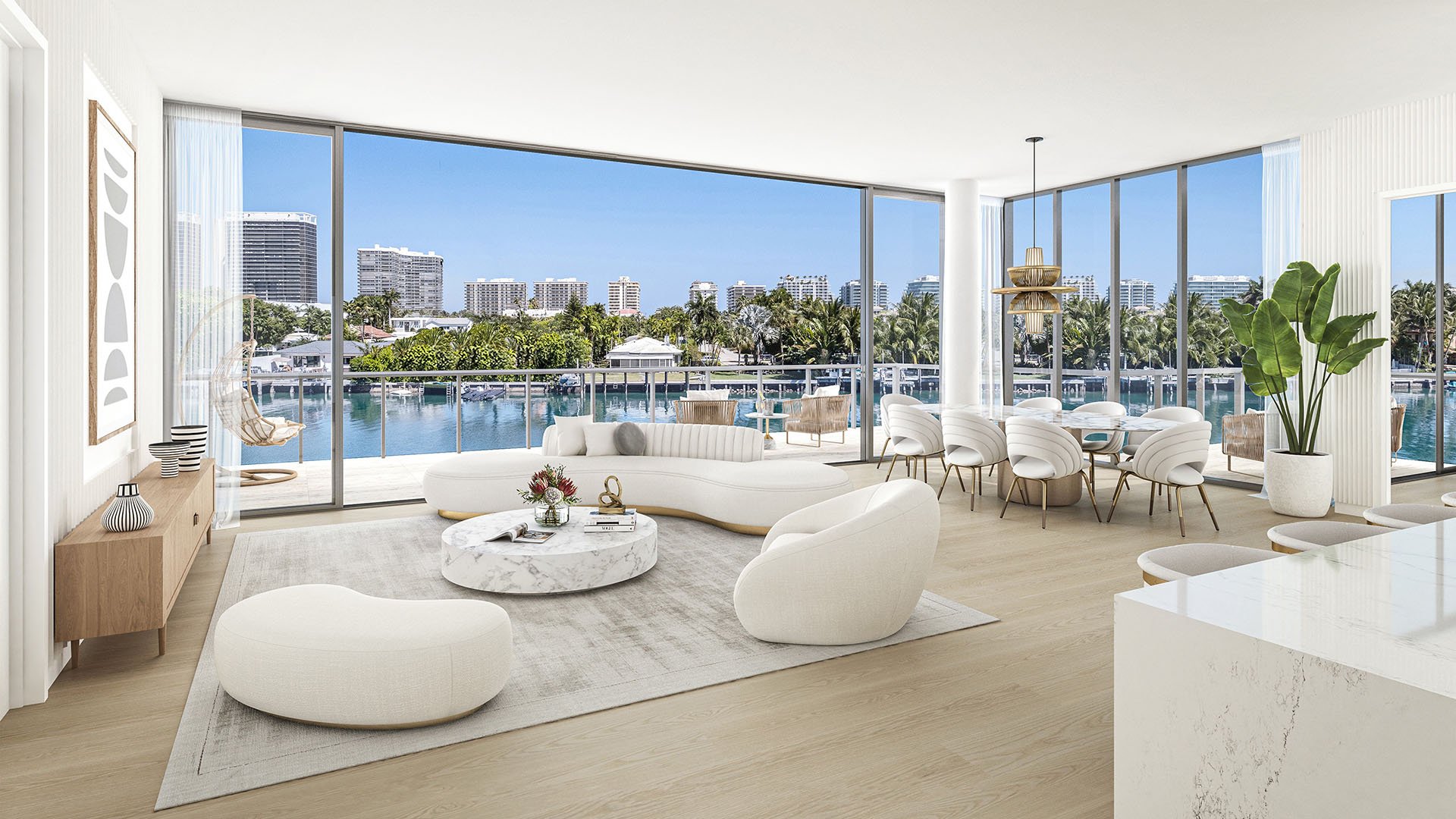 La Baia North Bay Harbor Islands, Miami, Florida corner residence open-concept living and dining with floor-to-ceiling glass and waterfront views, showcasing luxury and ultra luxury preconstruction condos.